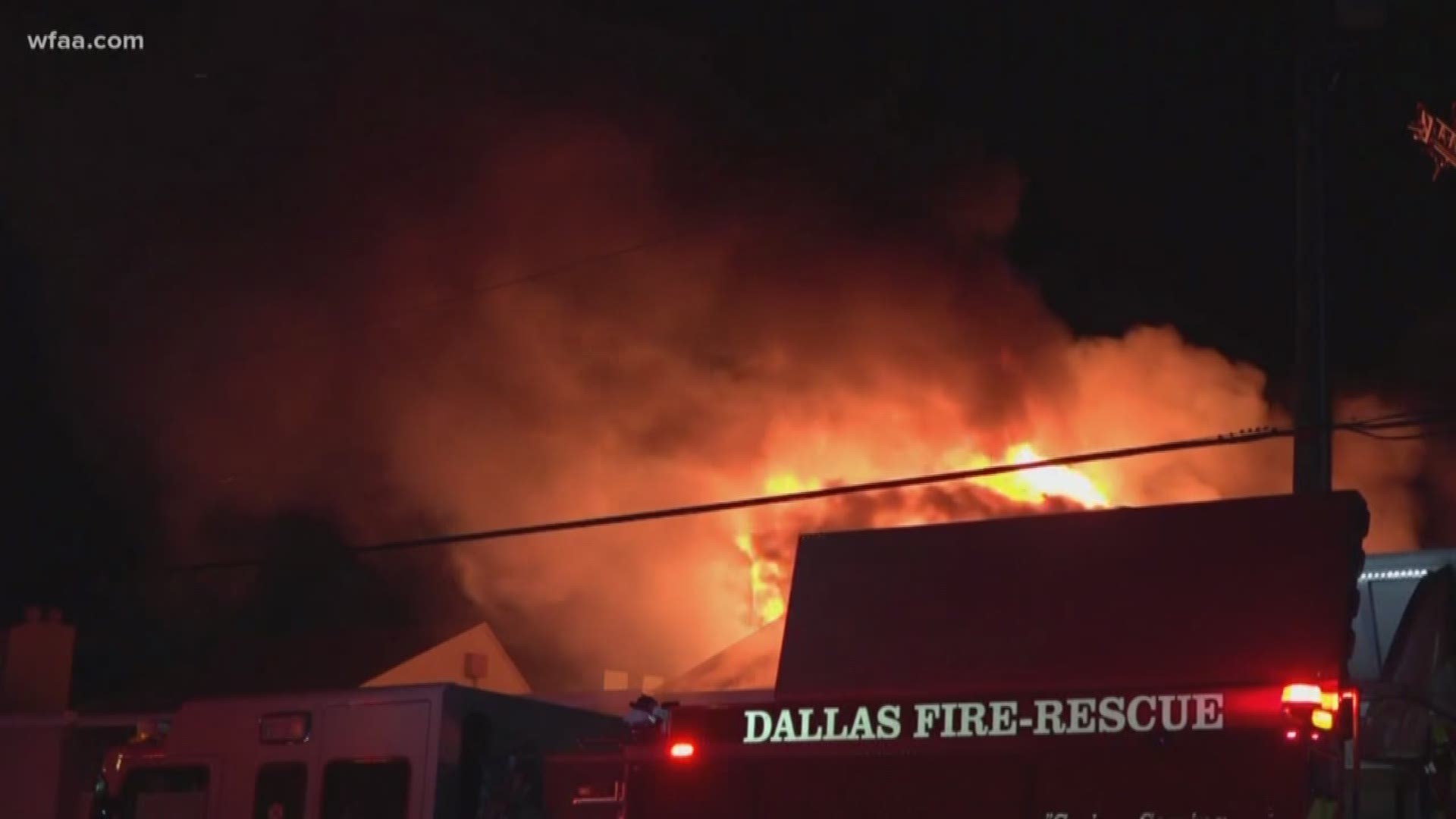 Firefighters battled a three-alarm apartment fire early Sunday morning in north Dallas.