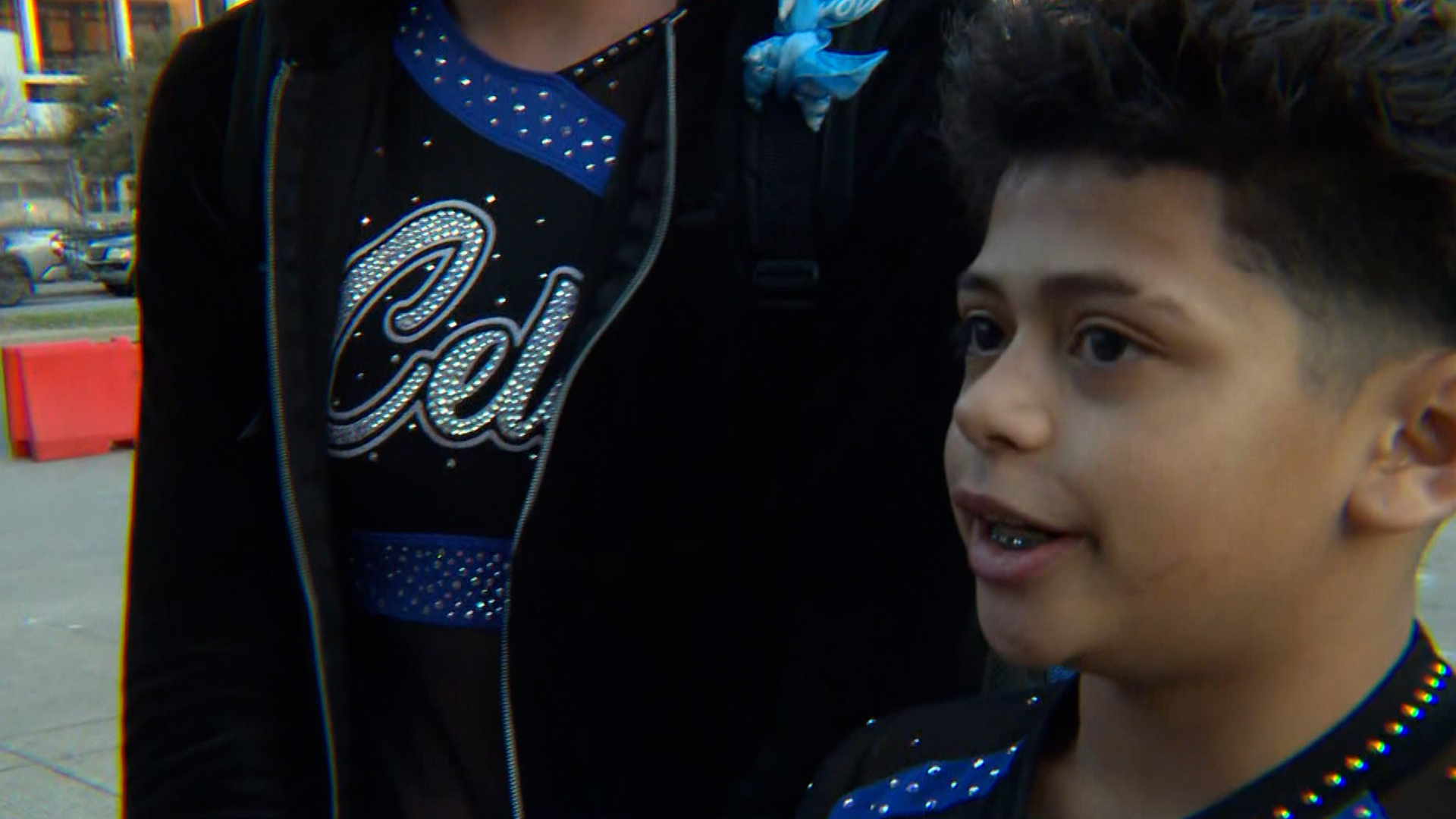 Parents and cheerleaders returned to the downtown Dallas convention center after a shooting scare caused an evacuation.