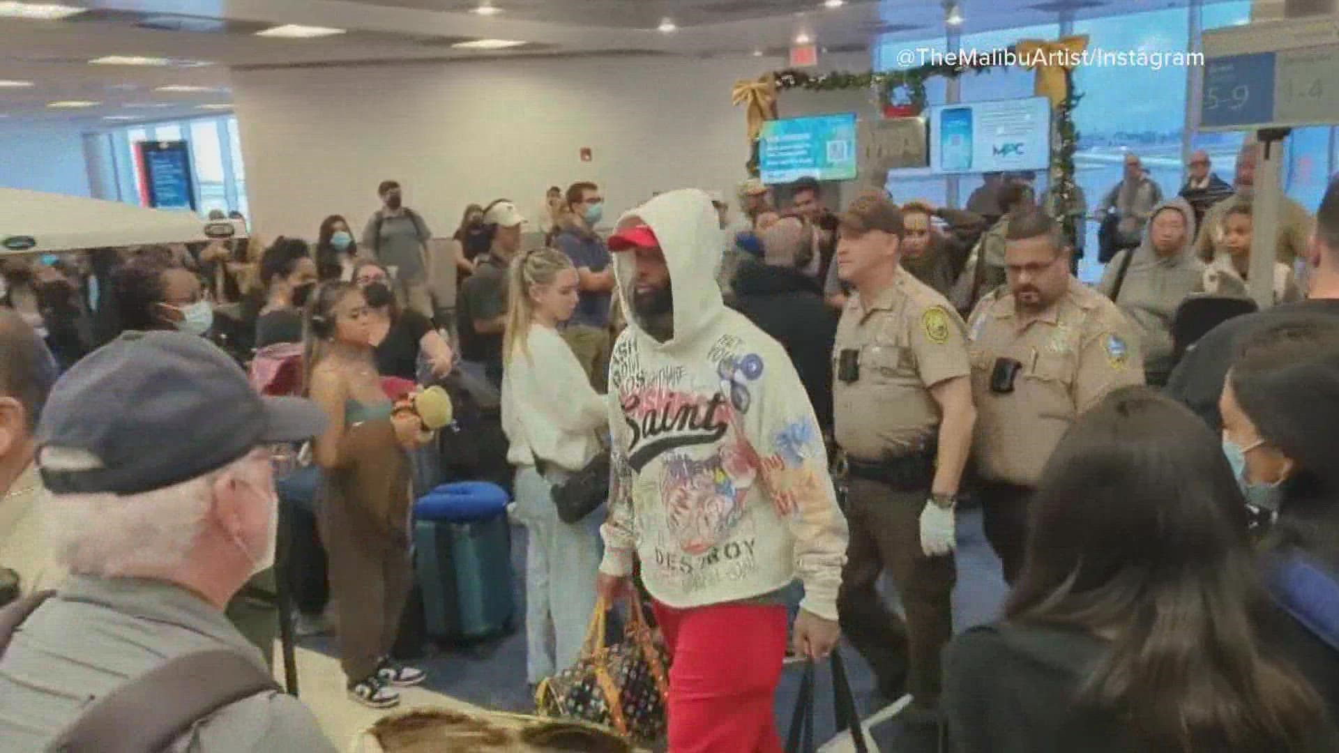 OBJ was on an LA-bound flight from Miami when he was escorted off the aircraft.