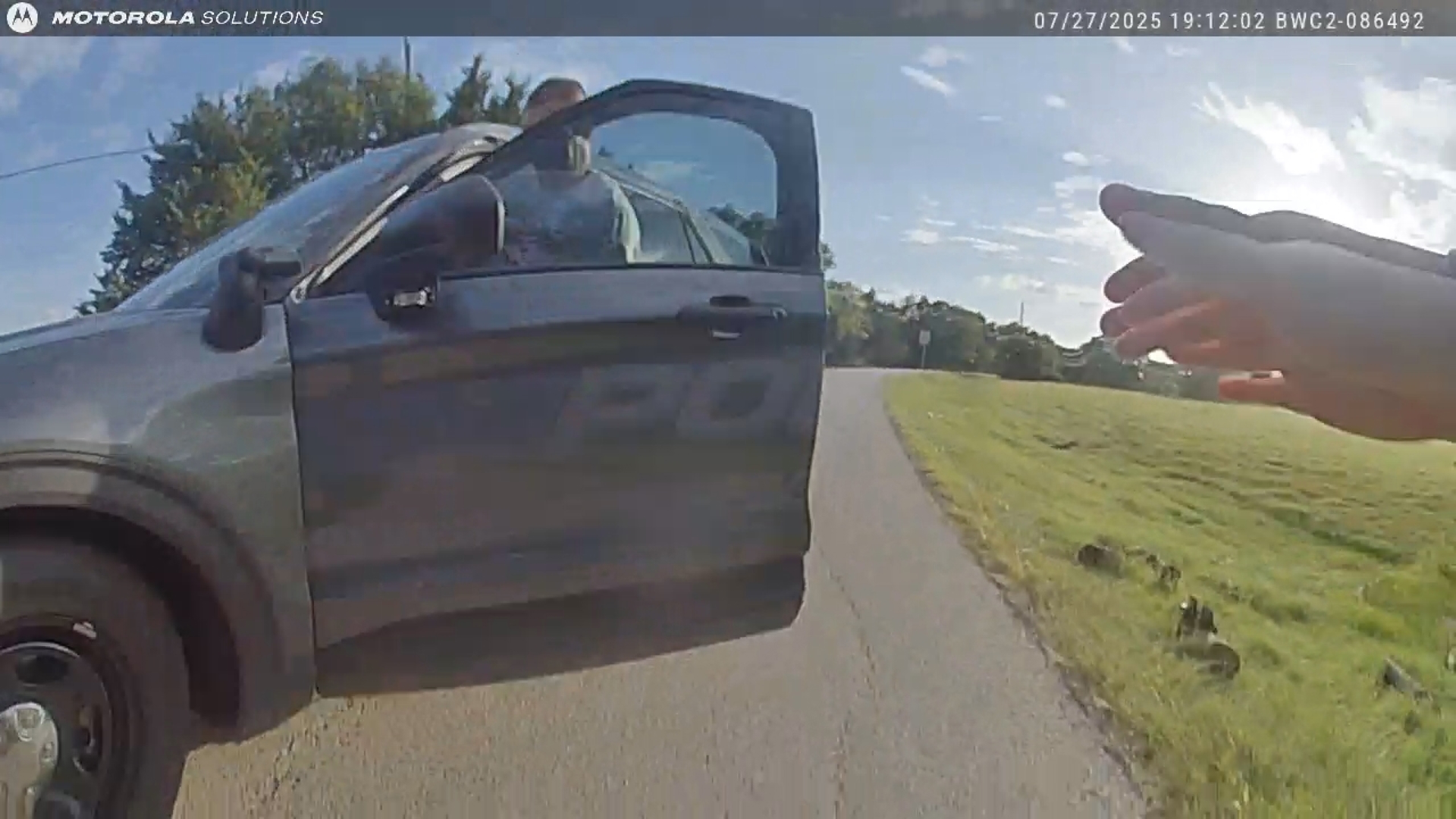 The Seagoville Police Department released body camera video of a police officer being dragged from his own patrol car after a suspect took the wheel.