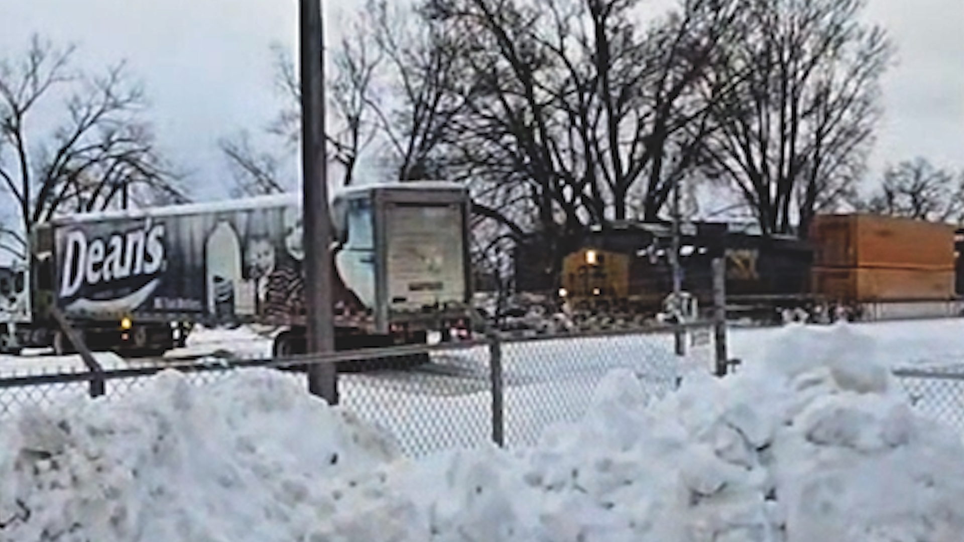 A truck driver narrowly escaped getting hit by a train in Erie, Pennsylvania, on Dec. 2, 2024.