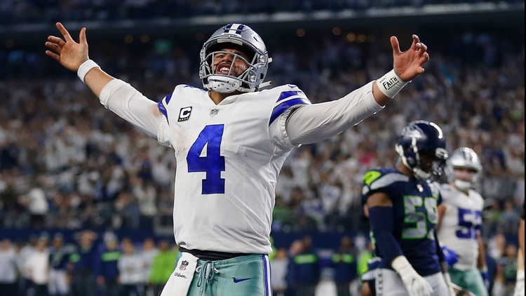 Dallas Cowboys' Dak Prescott celebrates a touchdown during the