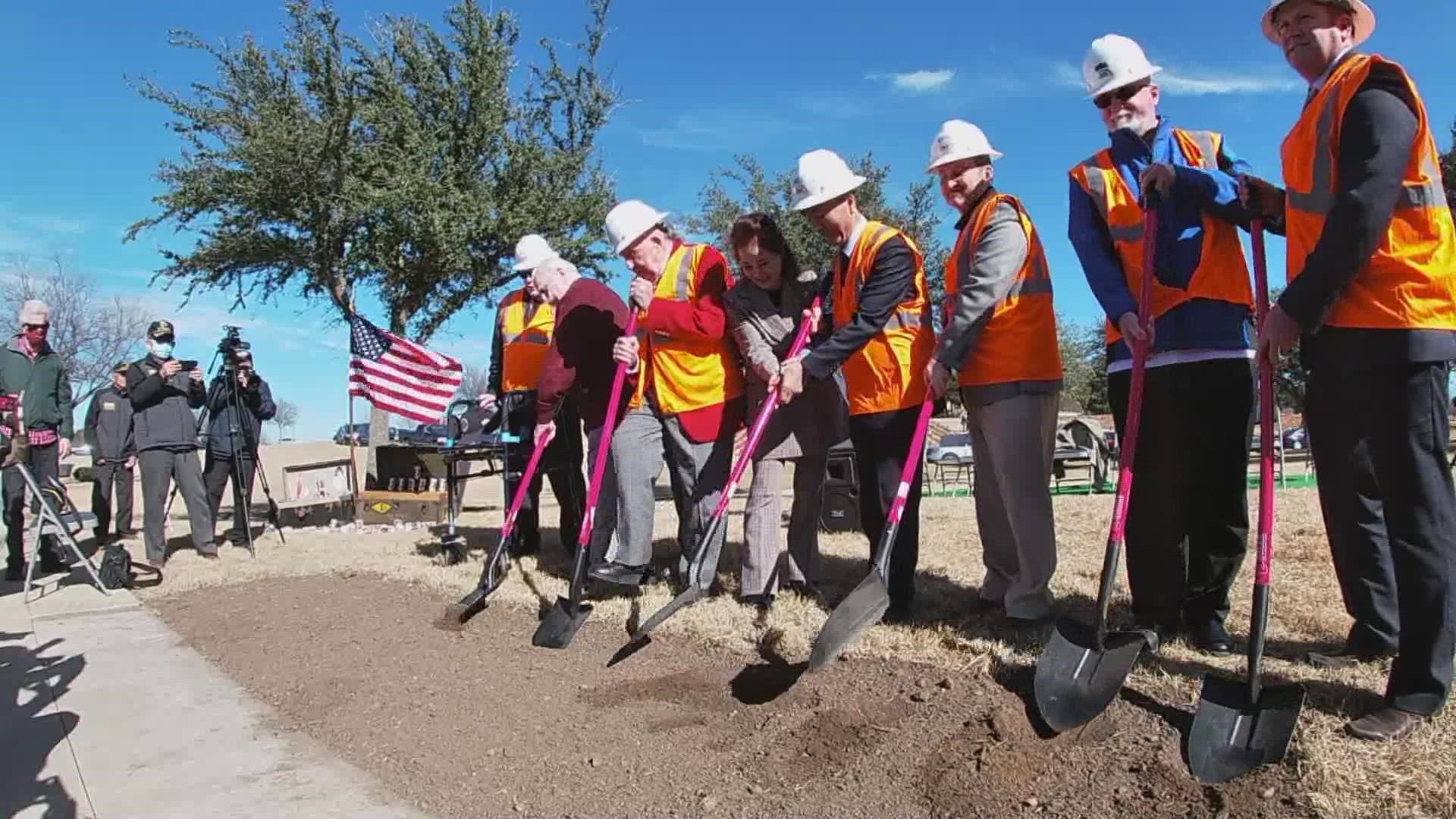Dignitaries and survivors of the Battle of Lake Jangjin dug shovels into the ground at Dallas-Fort Worth National Cemetery. Soon, a 12-foot memorial will be built.