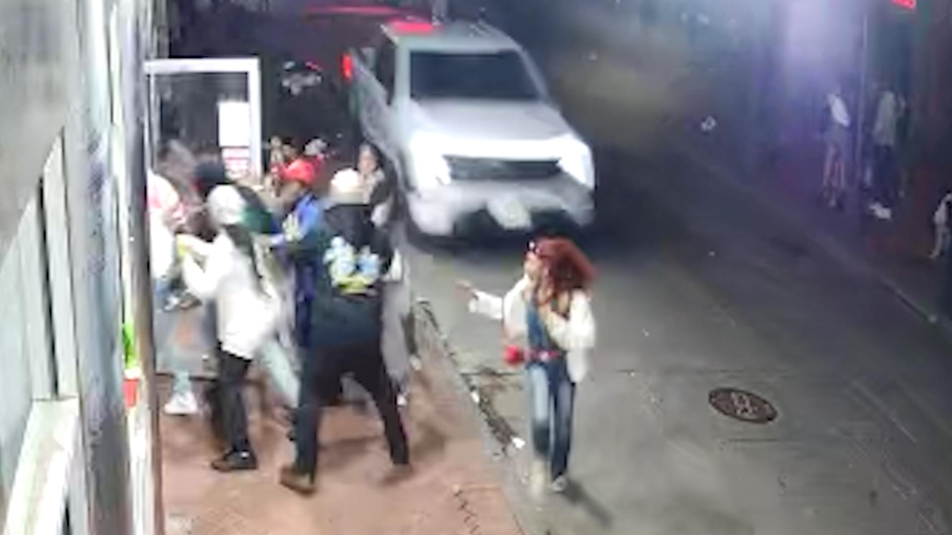 Video from the night of the New Orleans terror attack shows the shocking moments when the suspect drove down a crowded street. A woman narrowly avoids being hit.