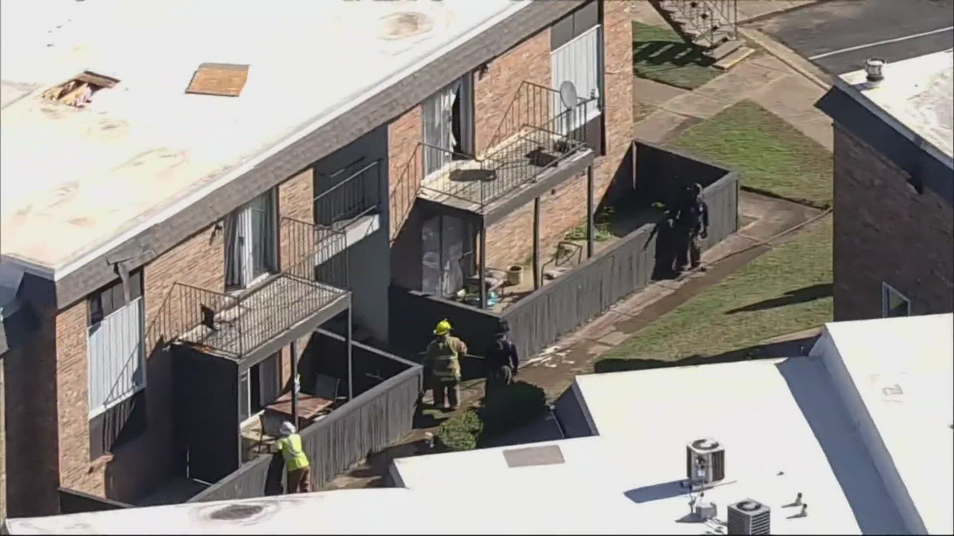 Two people and a dog were rescued from an apartment fire in Dallas ...