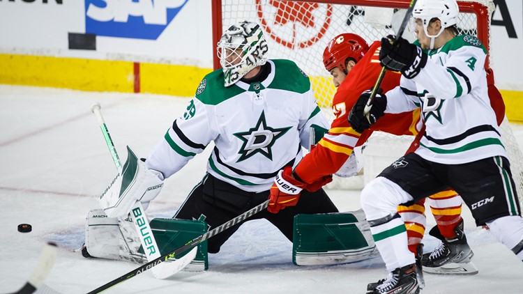 Oettinger makes 29 saves, lift Stars over Flames 2-0