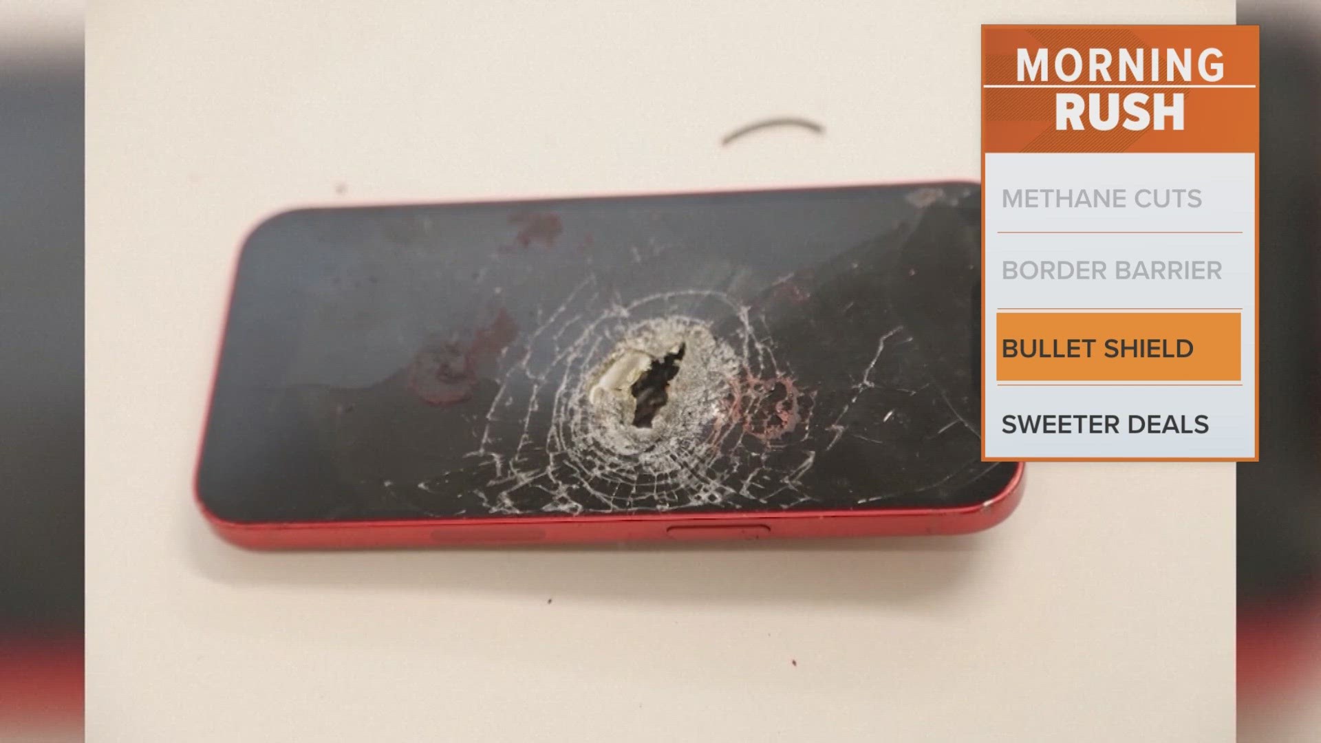 Martin County officials say the athlete was shot twice. One of the bullets struck his phone while he was using it.