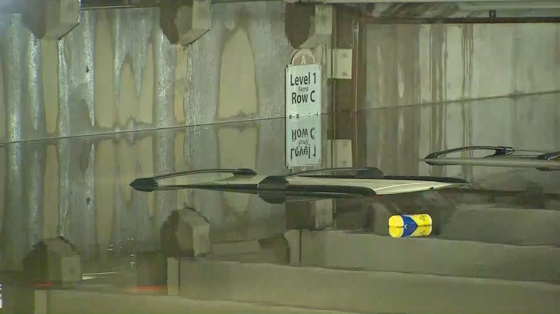 Flooding leaves vehicles underwater at Dallas Love Field parking garage