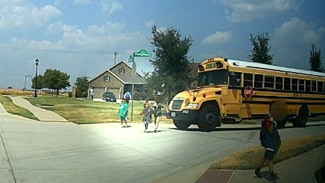 Video Denton ISD bus nearly hits kids; Driver put on leave