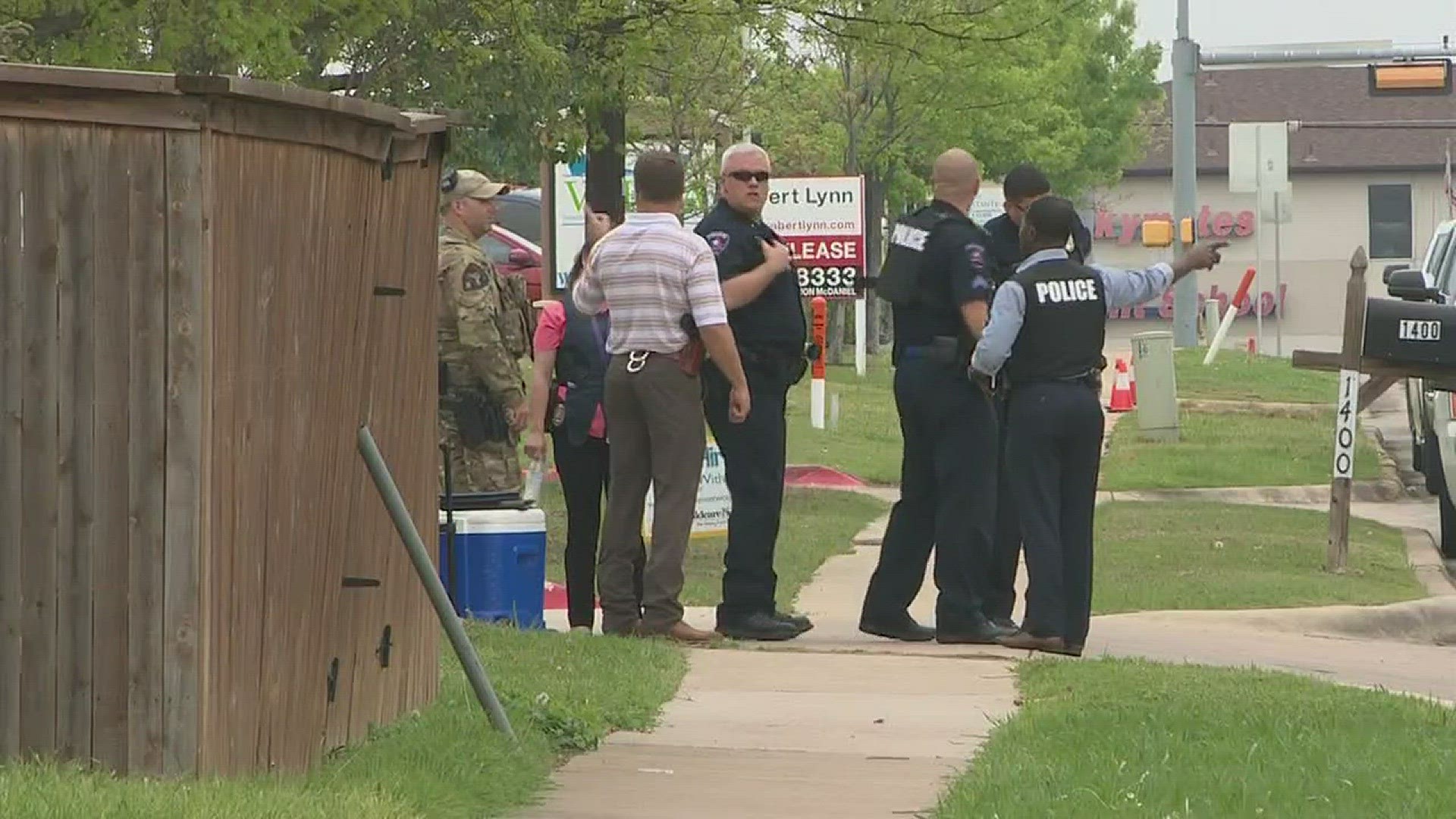 SWAT standoff over, suspect in custody following Arlington shooting ...