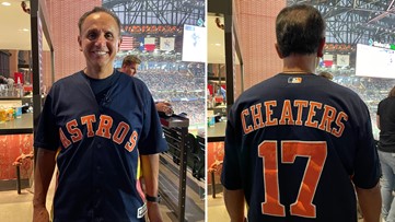 Creed band members at ALCS Game 3 in Texas Rangers gear