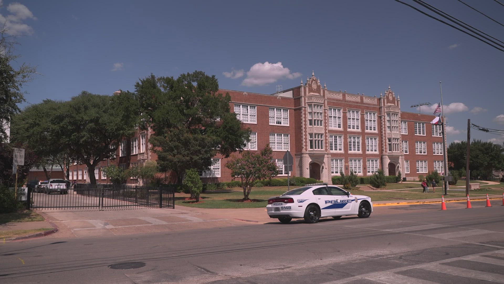 A student at a Dallas high school has been hospitalized after another student stabbed them in a bathroom, sources say.