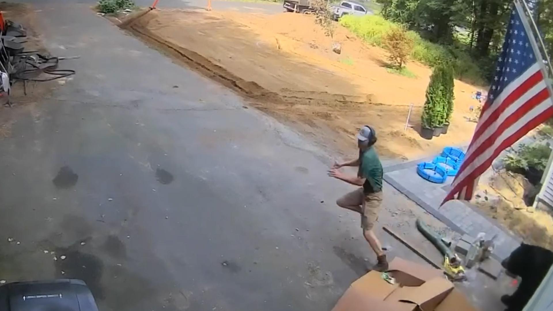 Connecticut man Andrew Hart was shocked when he rounded the corner and found a bear in a garage.