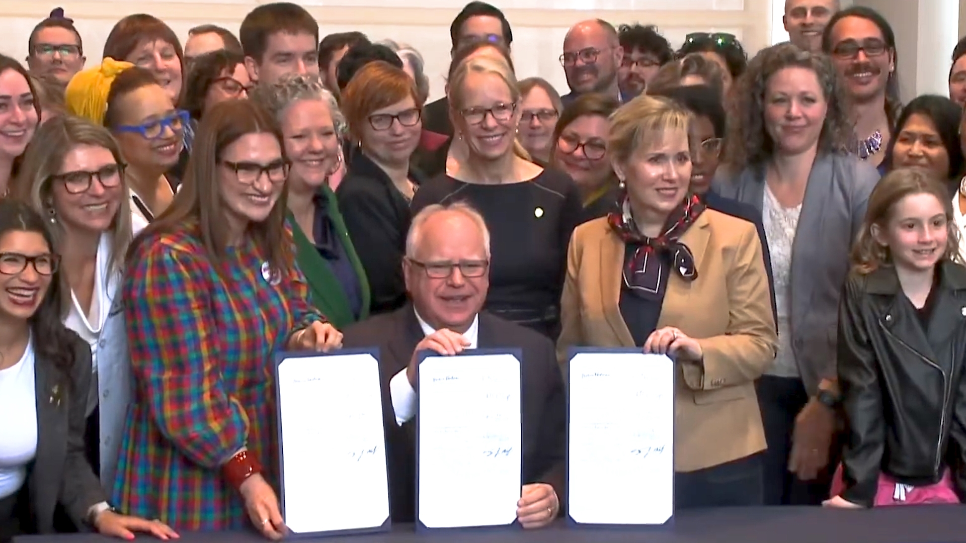 On April 27, 2023, Minnesota Governor Tim Walz signed three bills related to LGBTQ+ youth, conversion therapy and abortions.