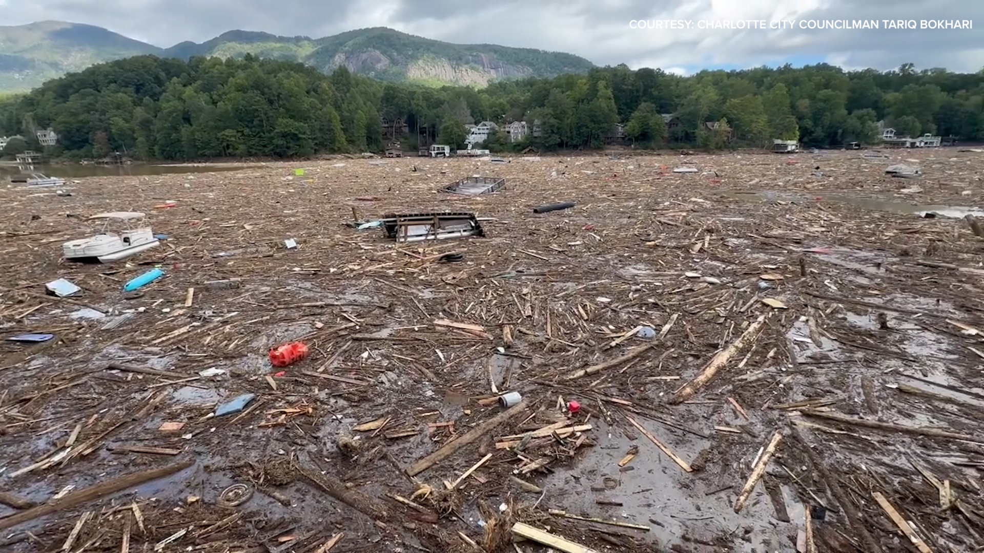 Look at some debris filling Lake Lure near Chimney Rock, North Carolina. This video was filmed after Hurricane Helene made landfall.