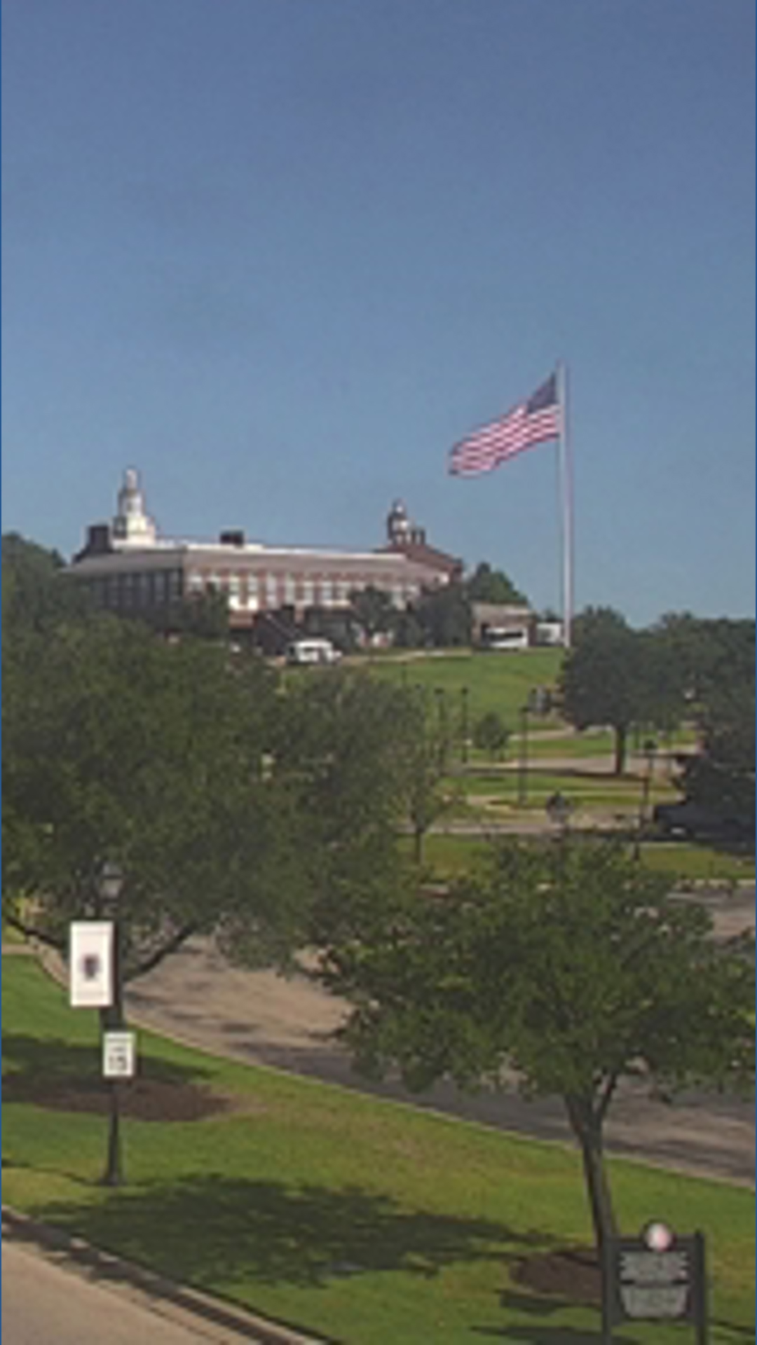 A WFAA camera near Dallas Baptist University shows a large plume of black smoke on the horizon.