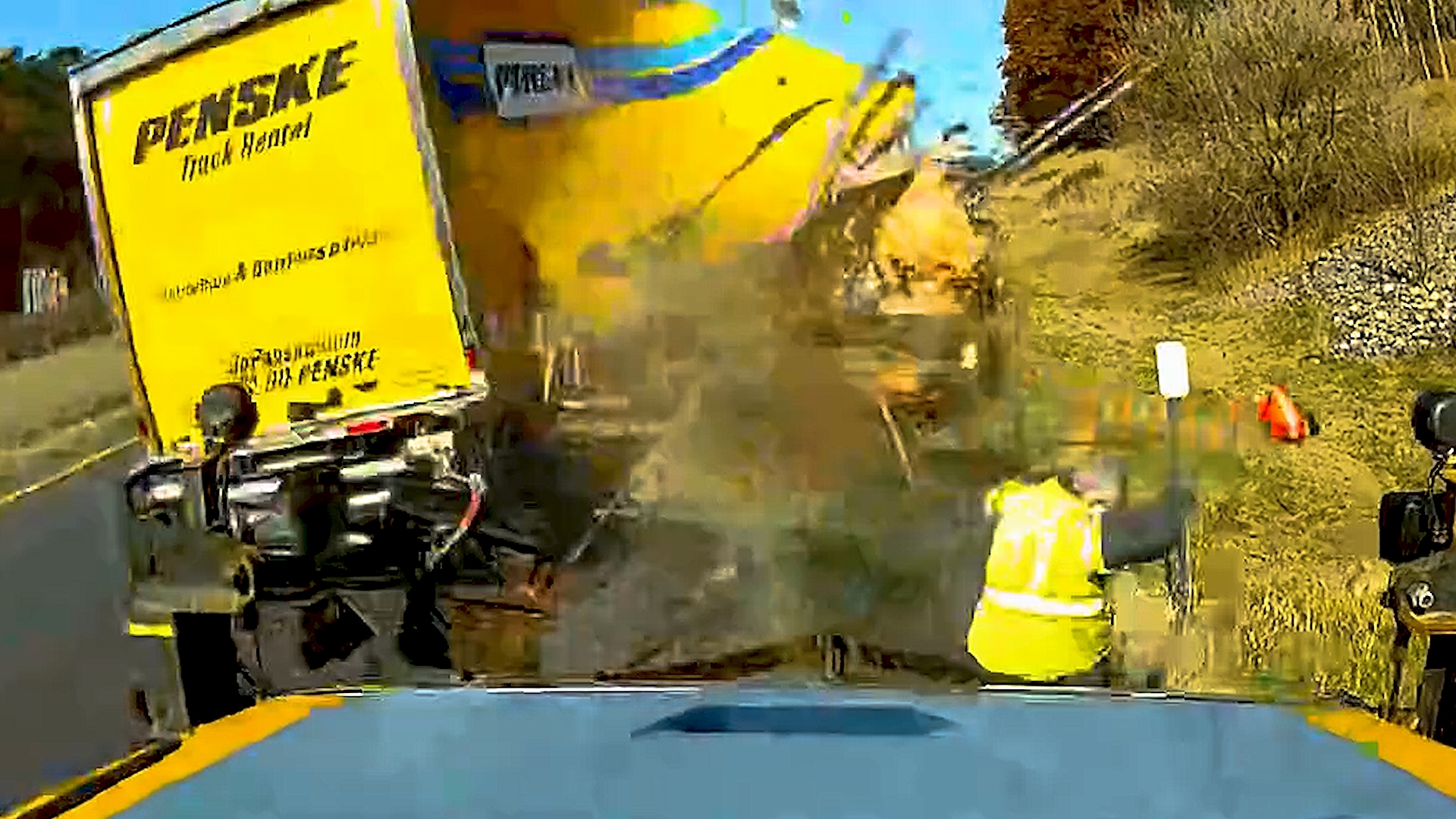 In the video, you can see the New York road worker move out of the way just before the truck smashes into the worker's equipment.