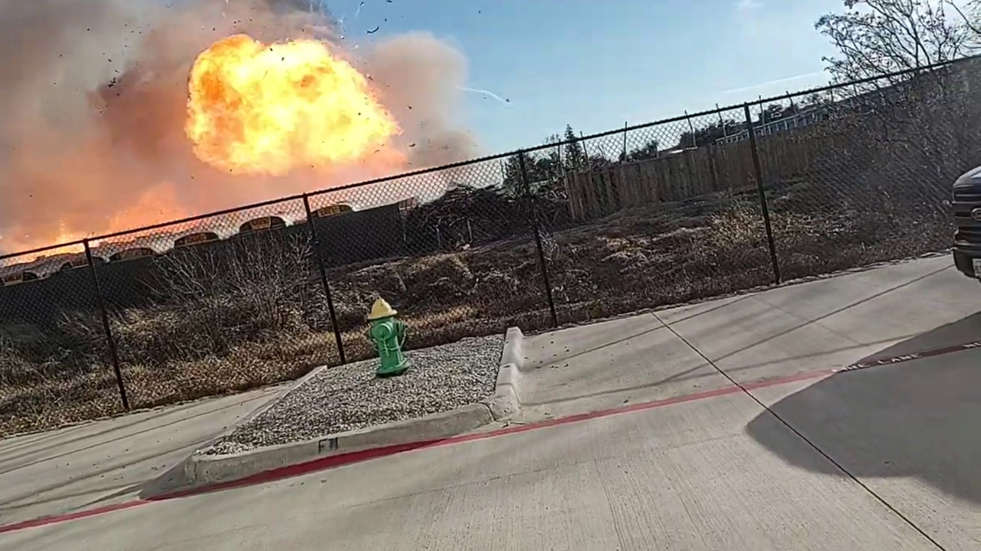 Dallas Fire-Rescue said the vehicles involved in the fire were compressed natural gas (CNG) vehicles, and that an explosion was heard from one of the CNG tanks