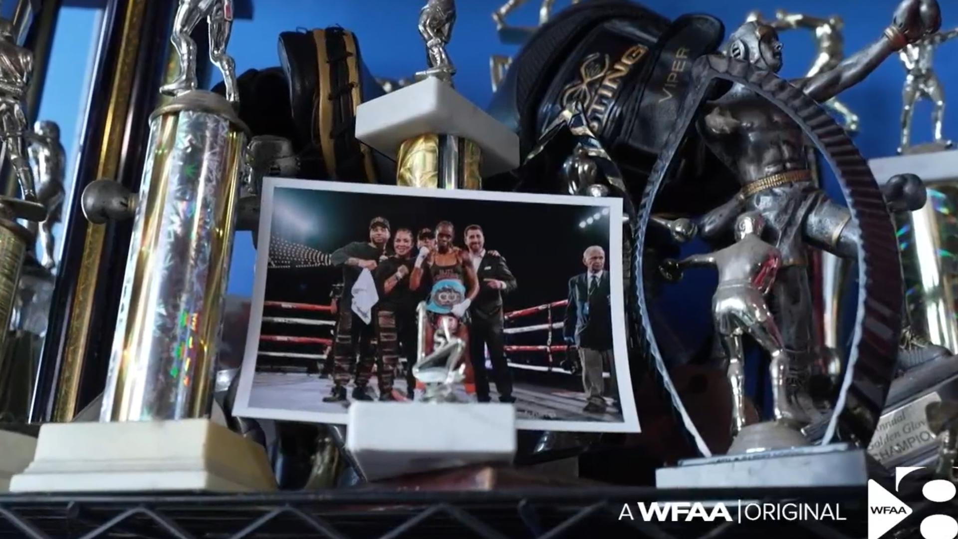 Metcalf won the IBF Bantamweight World Championship, inspiring her community by balancing both professional boxing and motherhood.