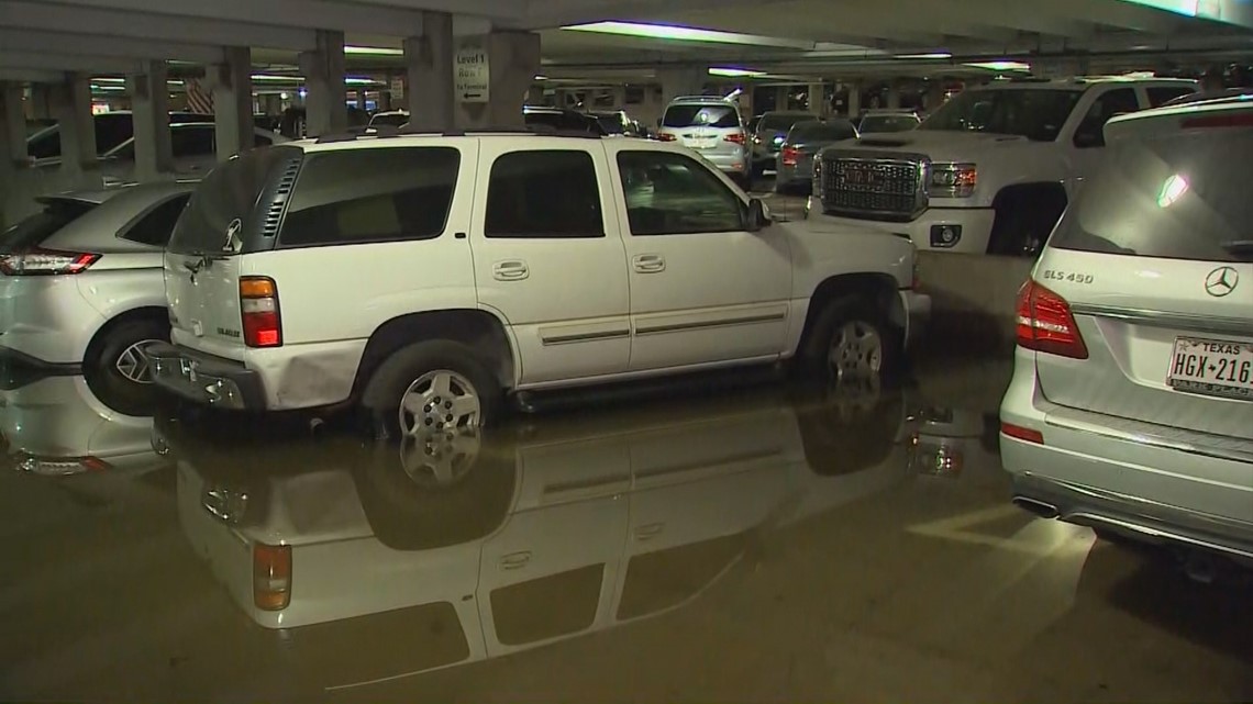 Flooding leaves vehicles underwater at Dallas Love Field parking garage ...