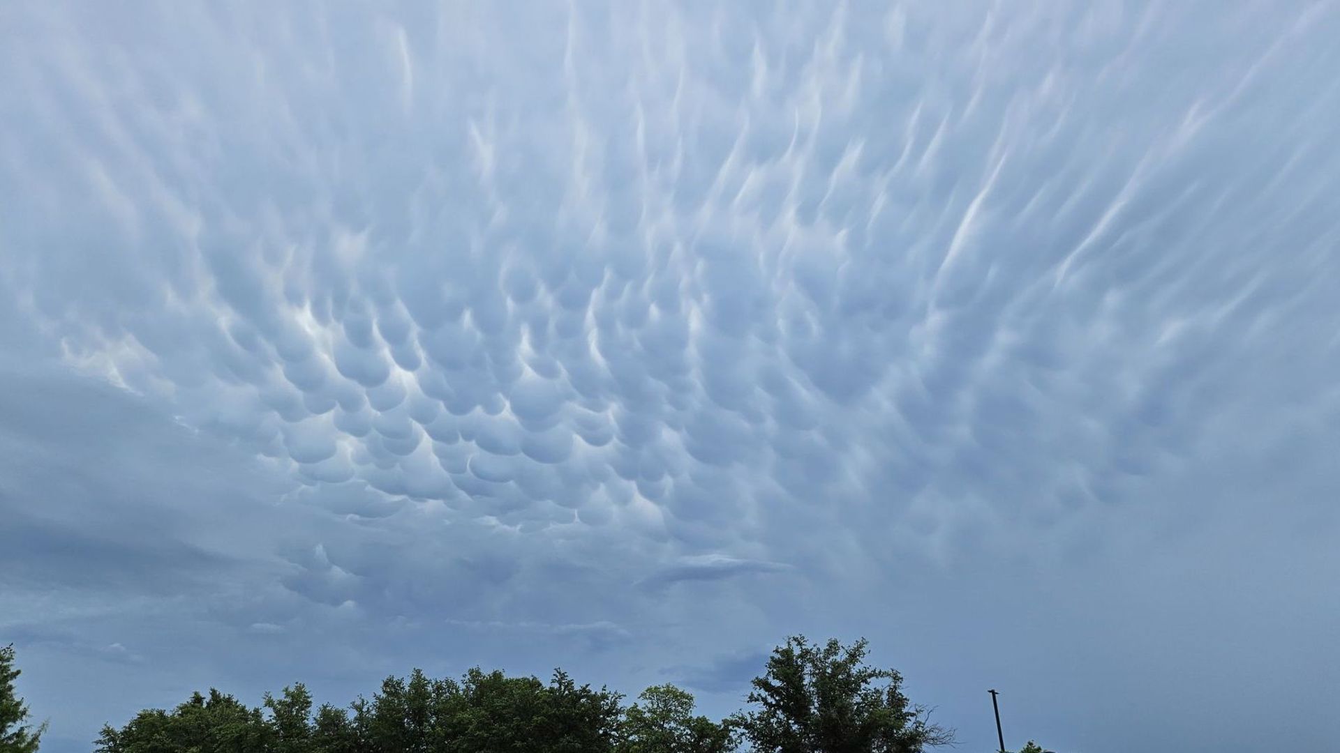 What are those strange looking clouds above DFW?