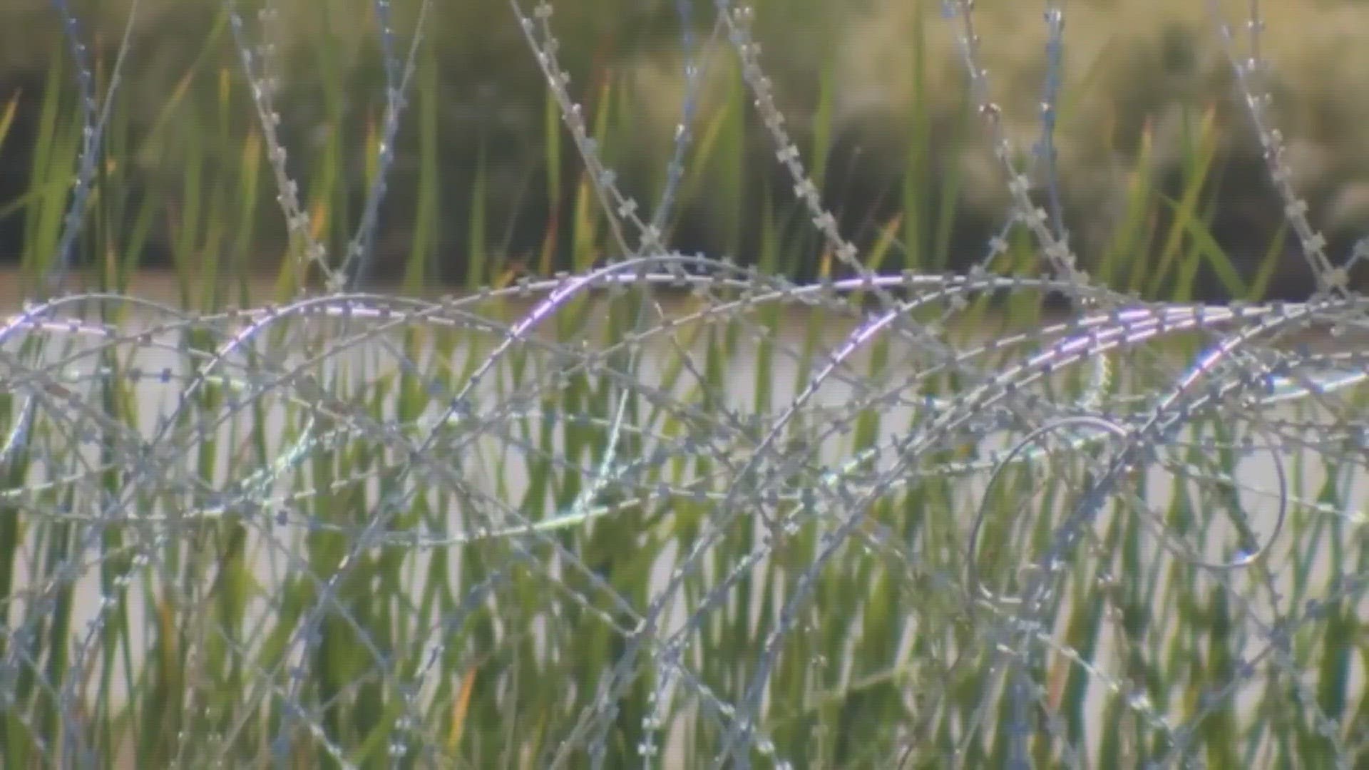 There's been back-and-forth between the state and the White House over whether the razor wire had to be removed.