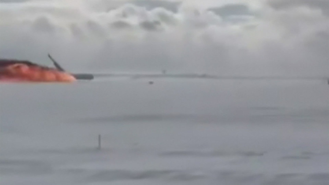 New video shows the moment a Delta Airlines jet flipped over and caught fire while trying to land | wfaa.com
