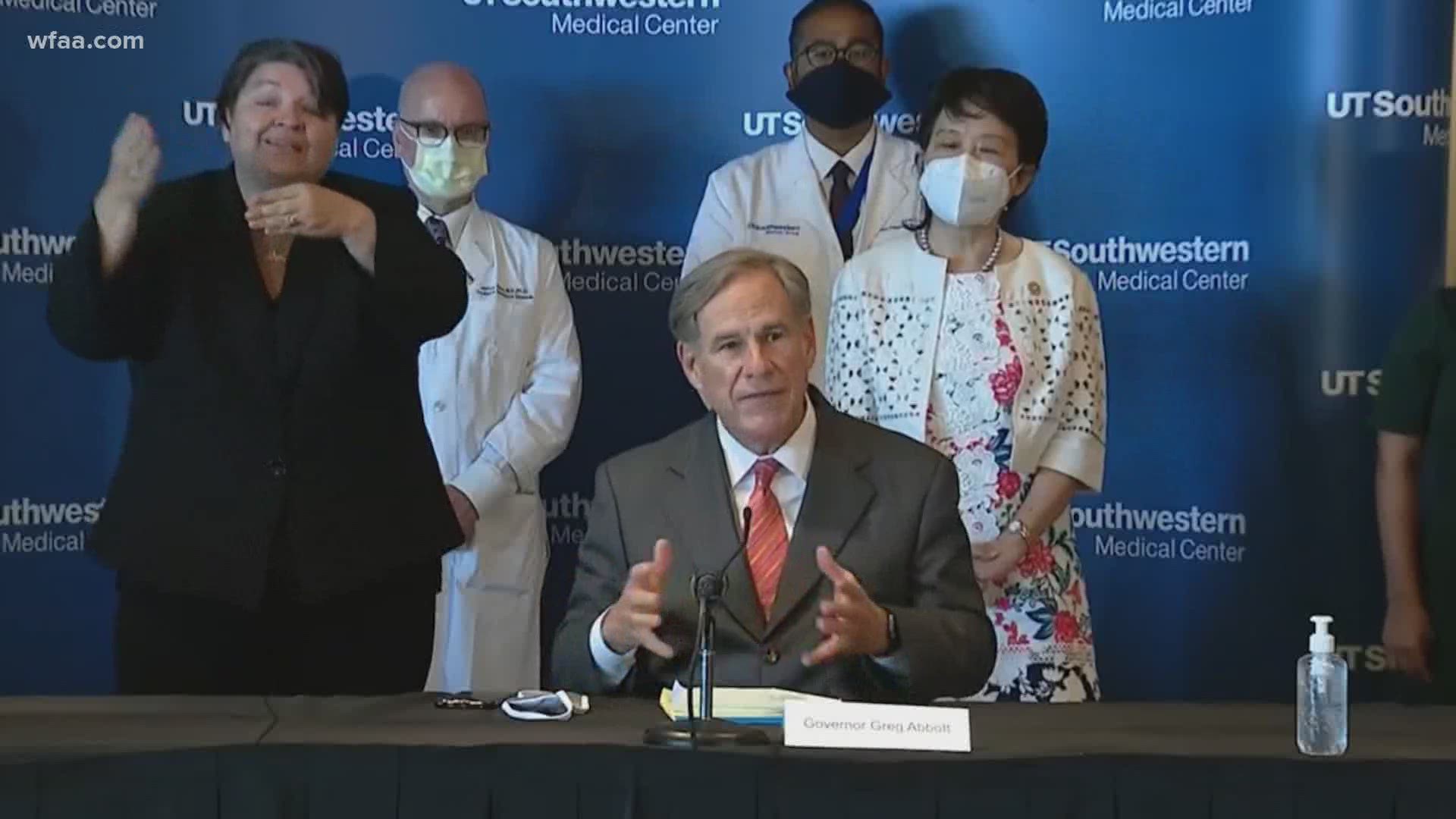 The Texas governor said that though daily new coronavirus cases are dropping in Dallas-Fort Worth, people should continue to exercise caution.