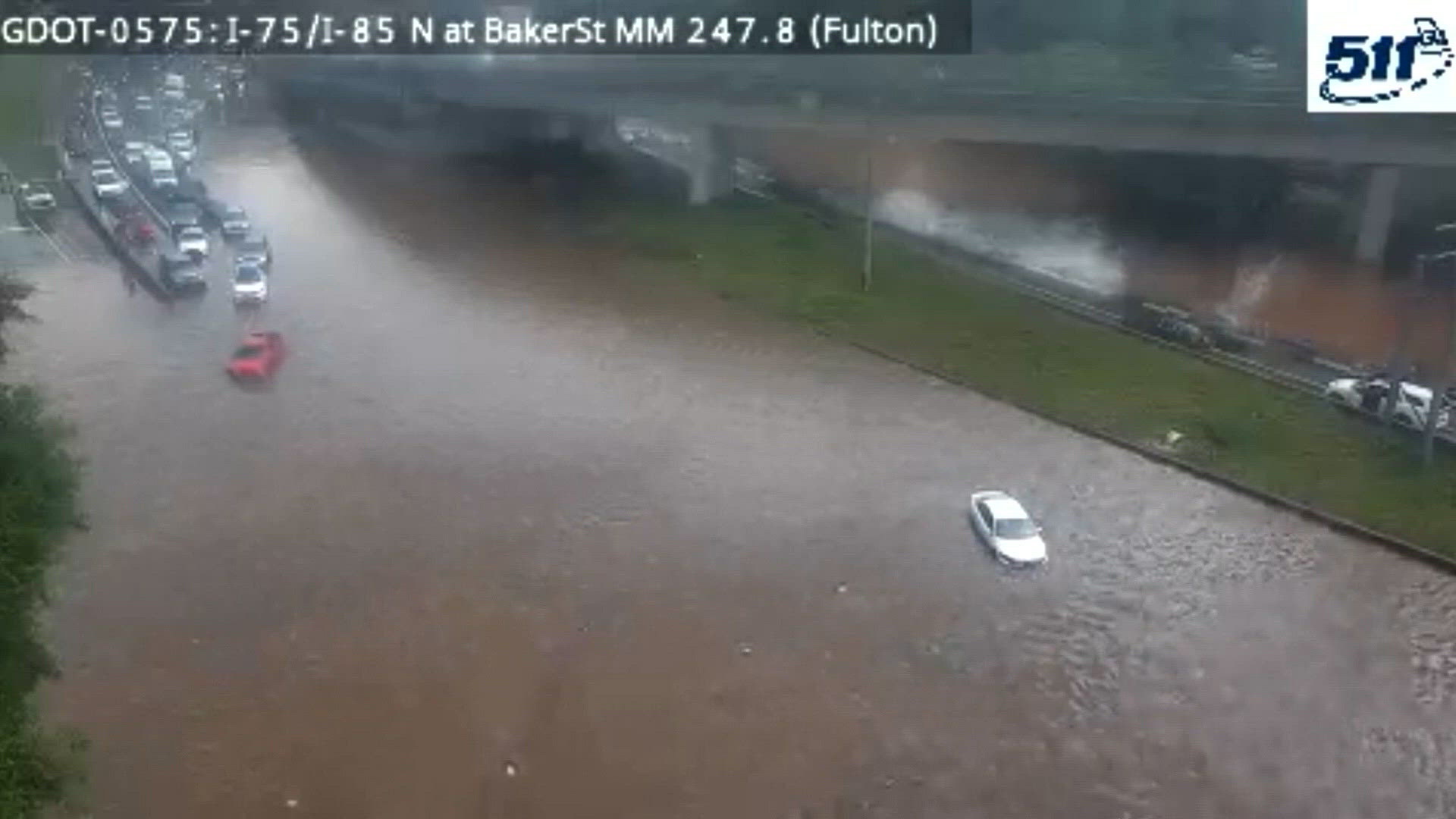 Flooded roads stop traffic in Atlanta after heavy rains fell there ...