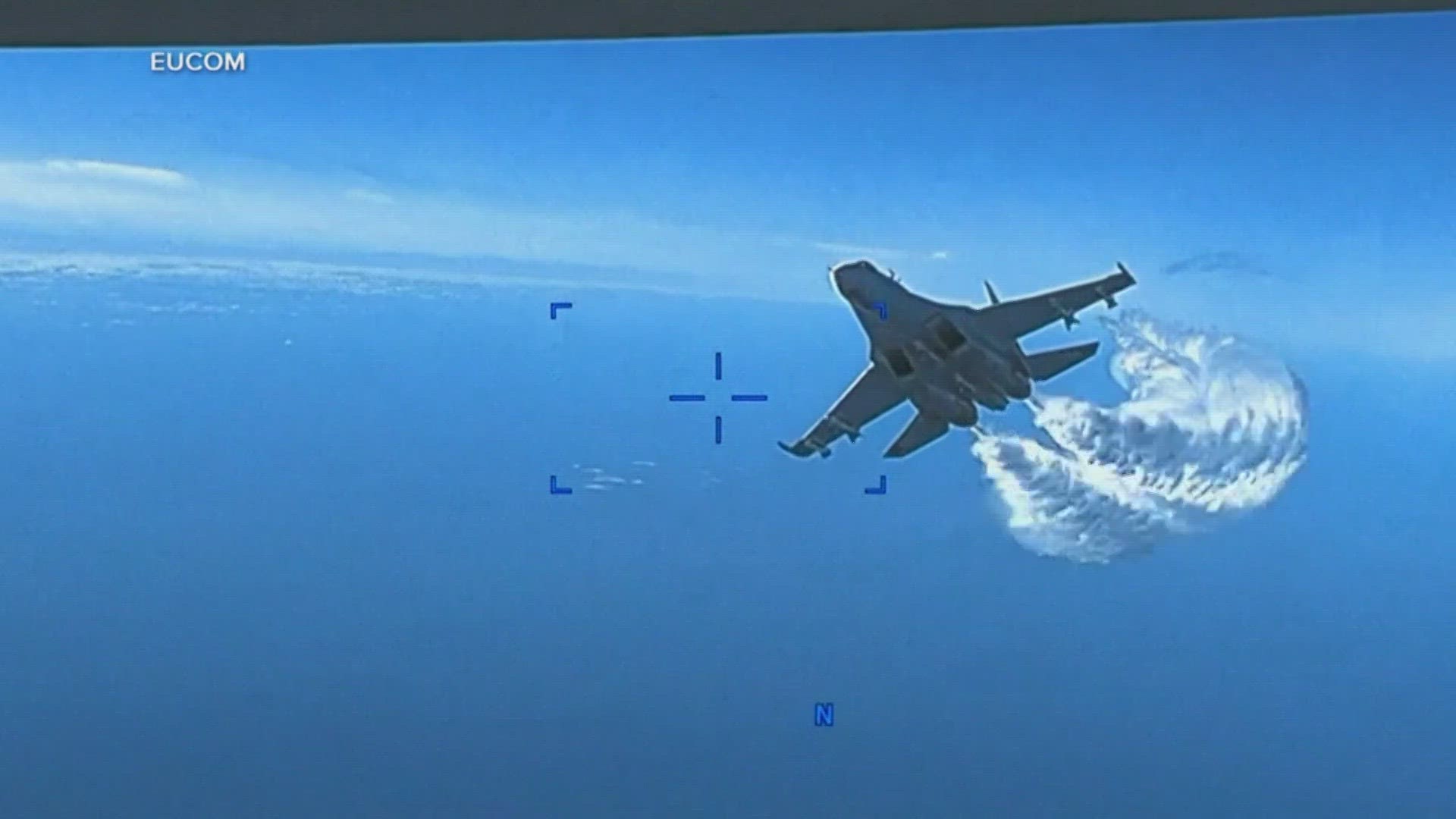 The U.S. military’s declassified 42-second footage shows a Russian jet approaching the back of the Reaper drone and releasing fuel as it passes, the Pentagon said.