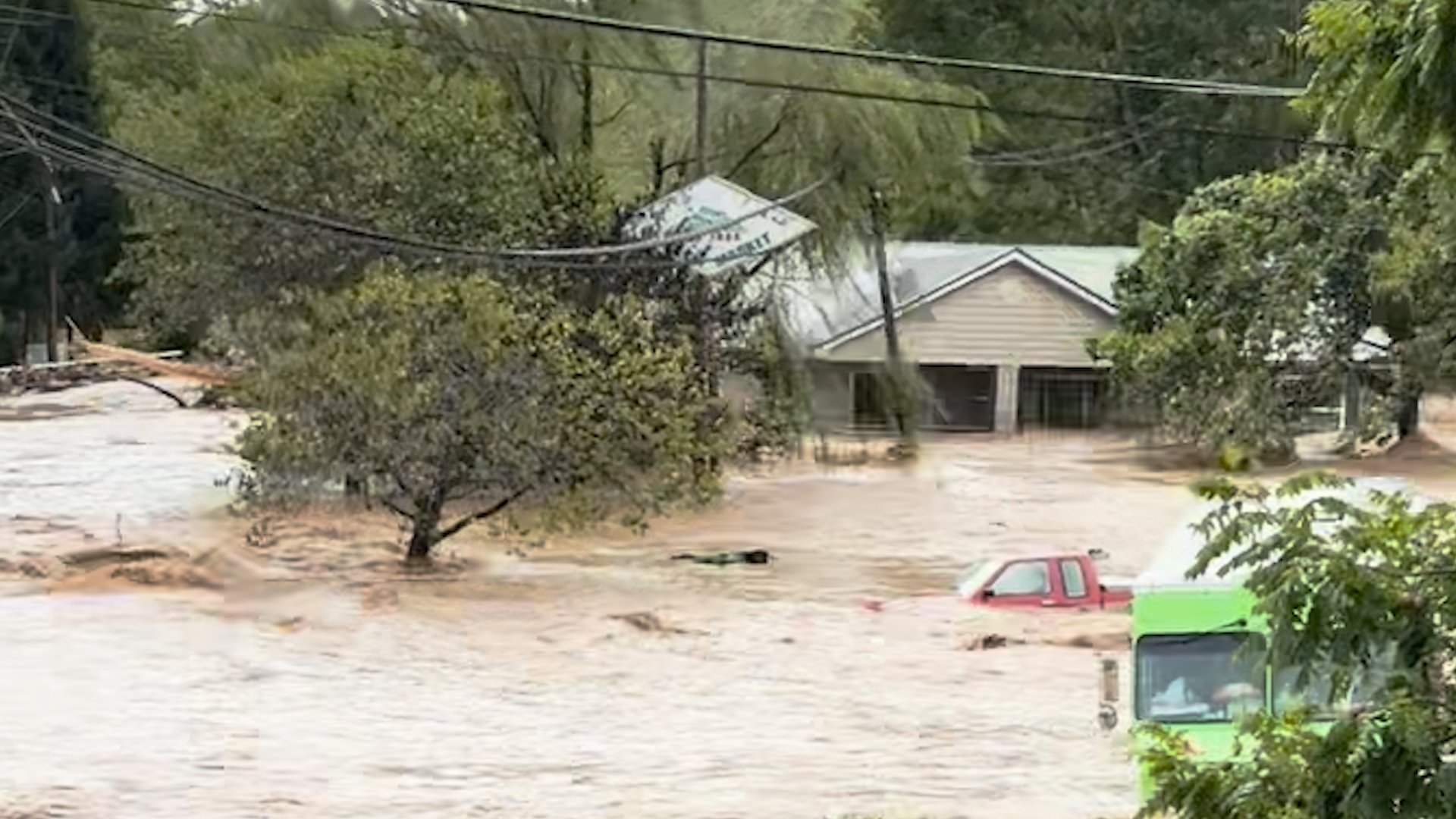 A viewer captured video of a house washed away in Asheville, North Carolina, during Helene flooding on September 27, 2024.