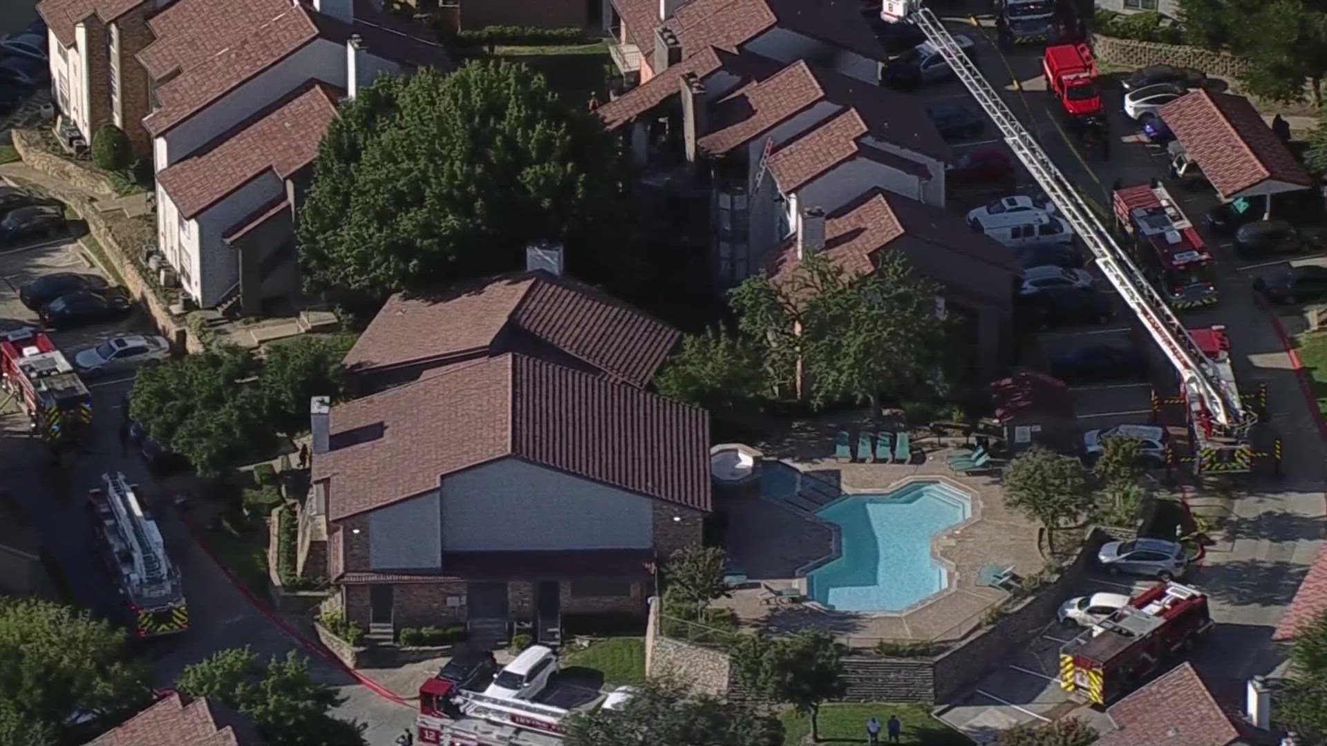 Firefighters were fighting a three-alarm fire at an apartment complex in Irving.