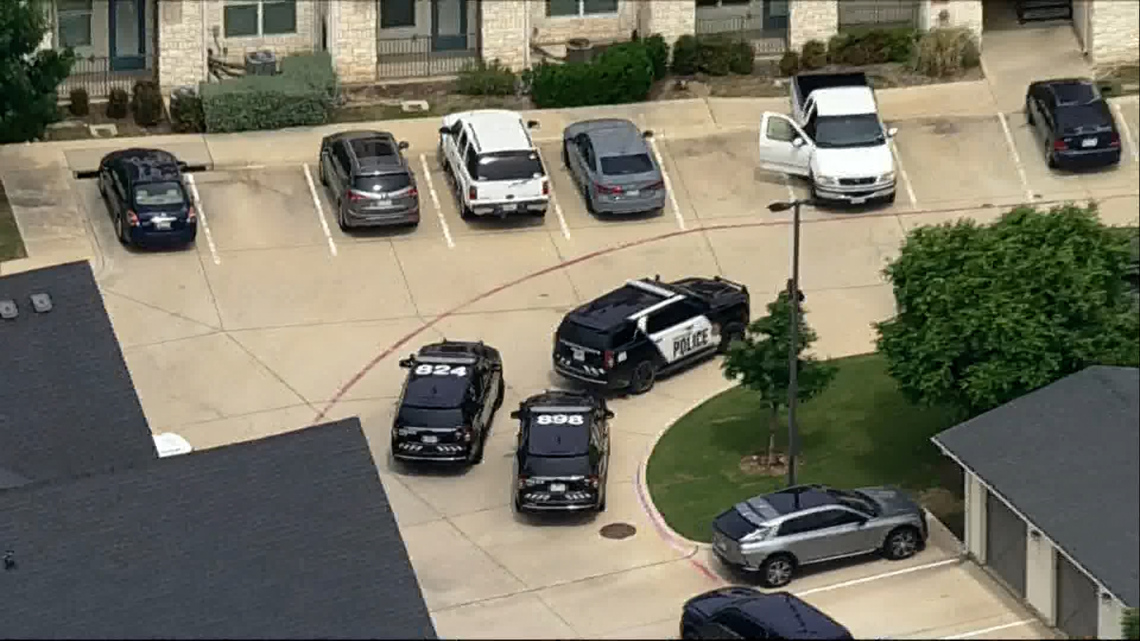 An officer from an unidentified agency was involved in a shooting at a Fort Worth apartment complex, with police stating no threat to the public remains.