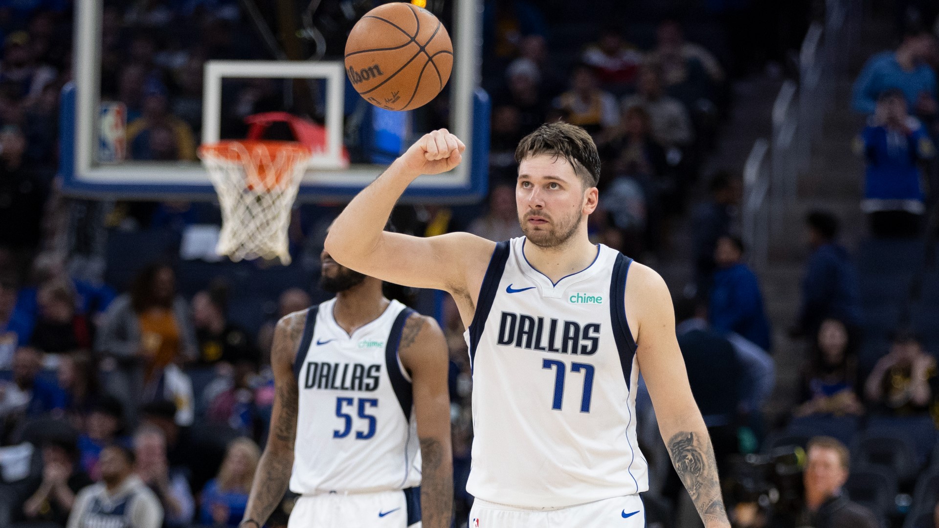 Luka Doncic scored 25 of his 39 points in the second half in his return to the lineup and the Dallas Mavericks beat the Golden State Warriors 132-122.