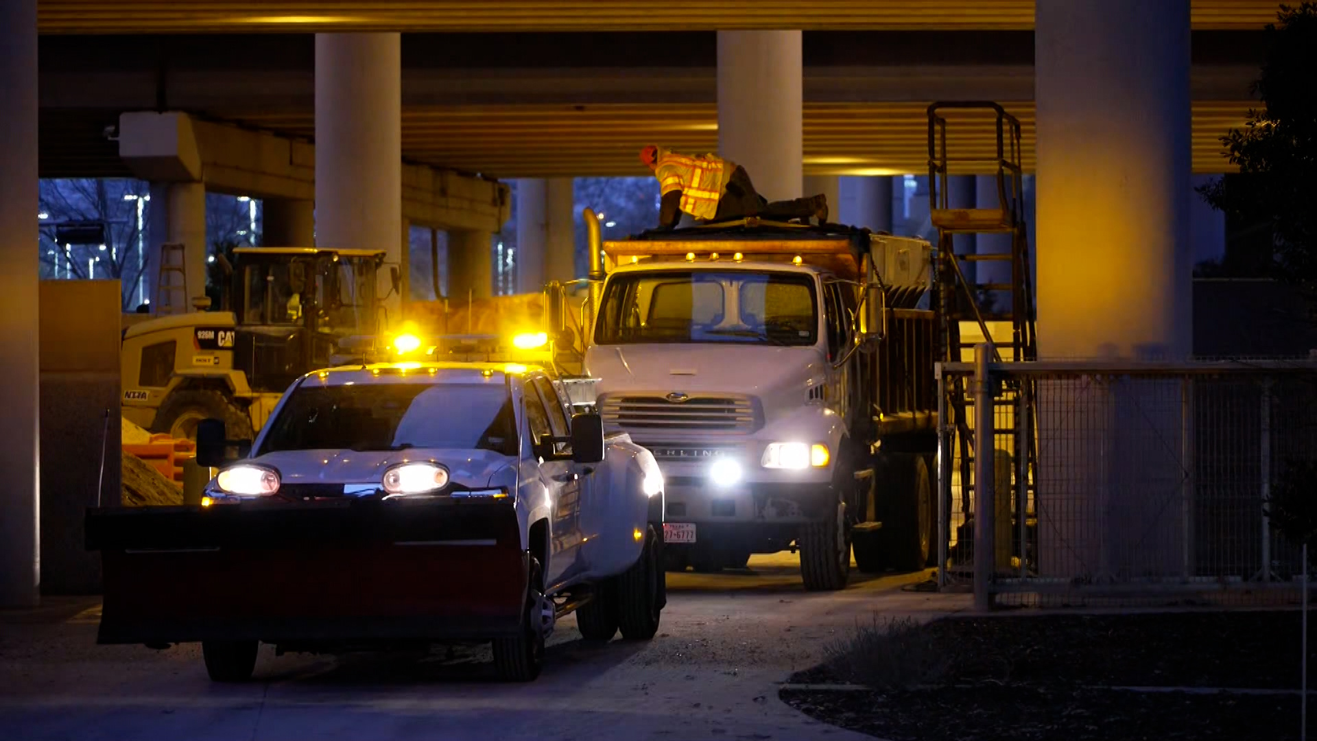 Sand crews prepared to treat roads in Plano Thursday as snow began to fall.