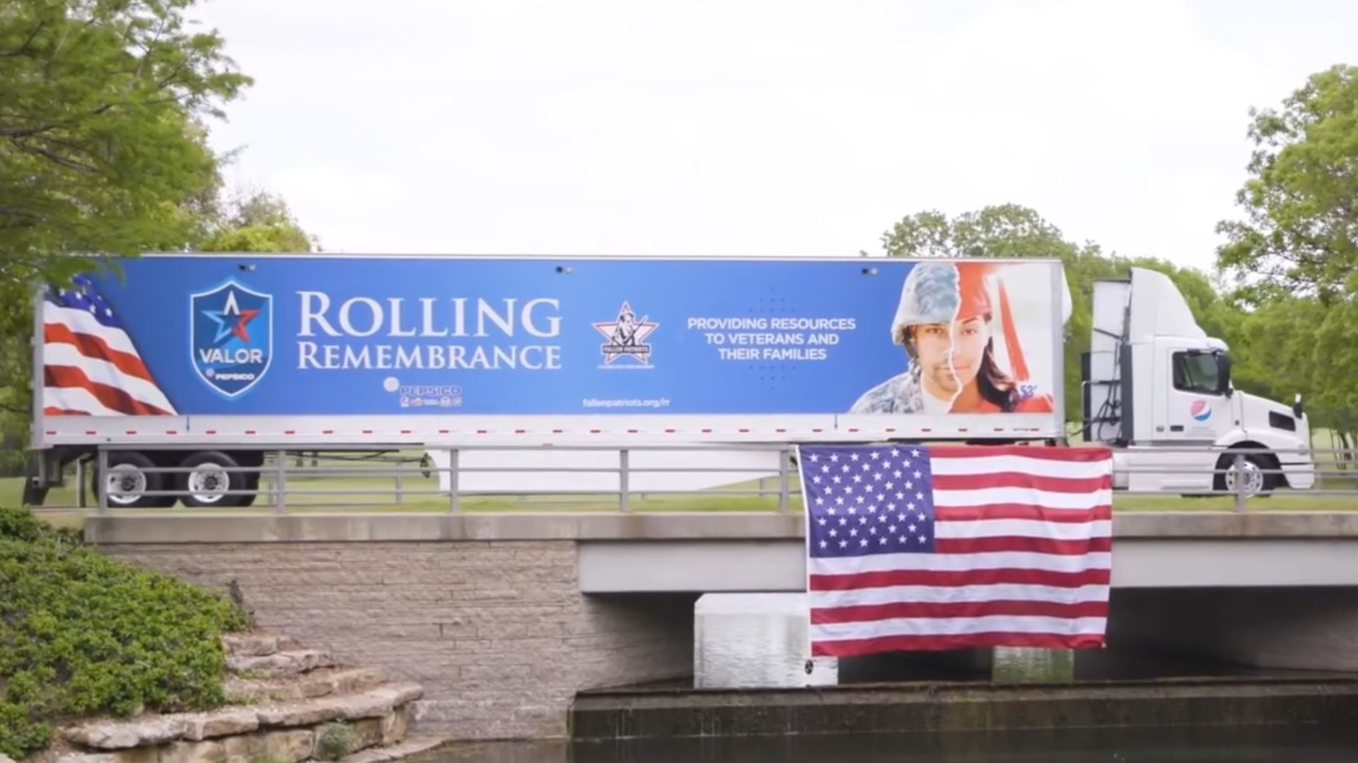 "I have to protect the flag, at all costs," said Otis Howell next to a semi trailer with "Rolling Remembrance" painted on the side. "That's what I feel about it."