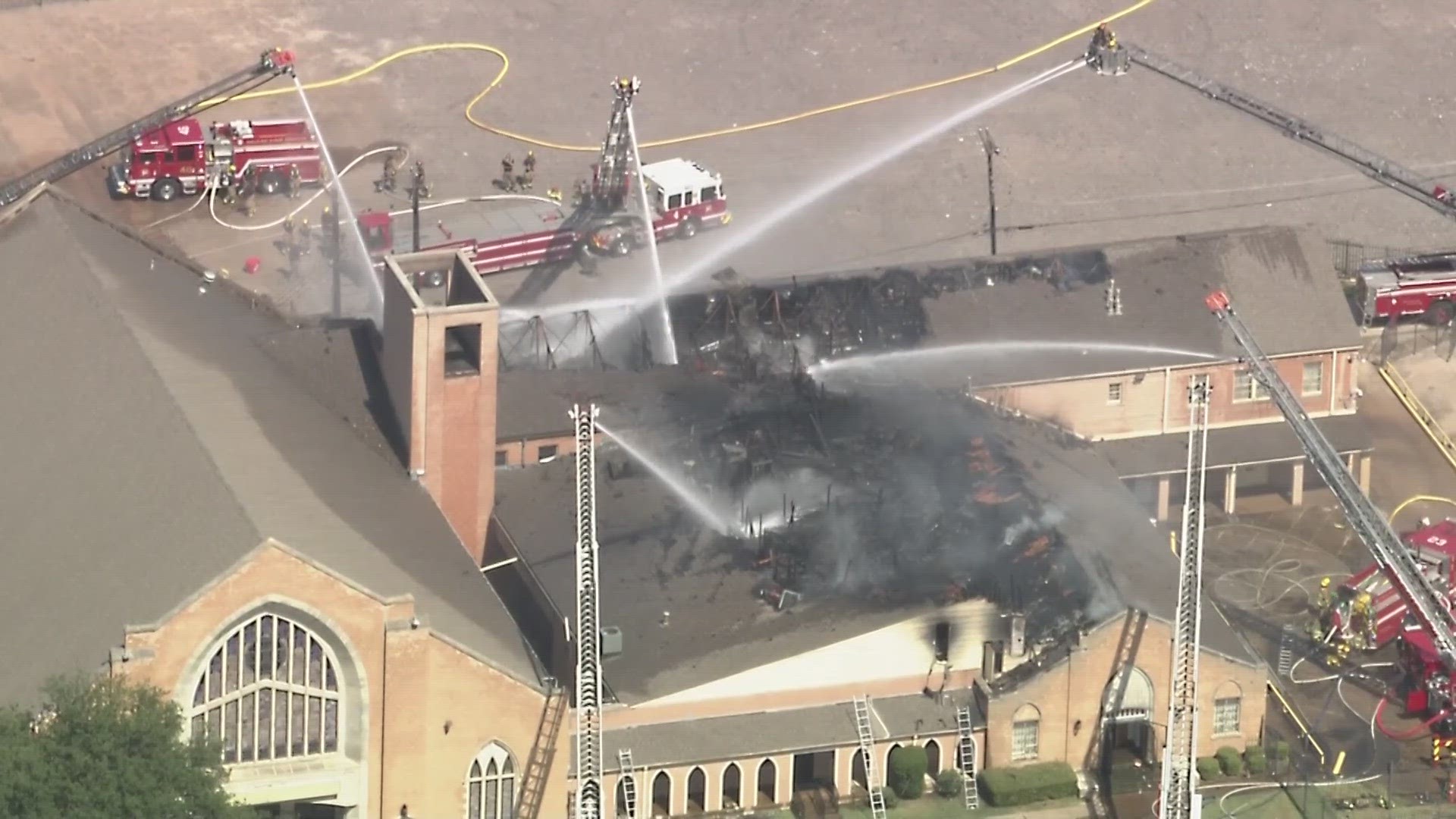 Dozens of firefighters are battling a huge fire on South Marsalis Avenue at the Saintsville Church of God in Christ.