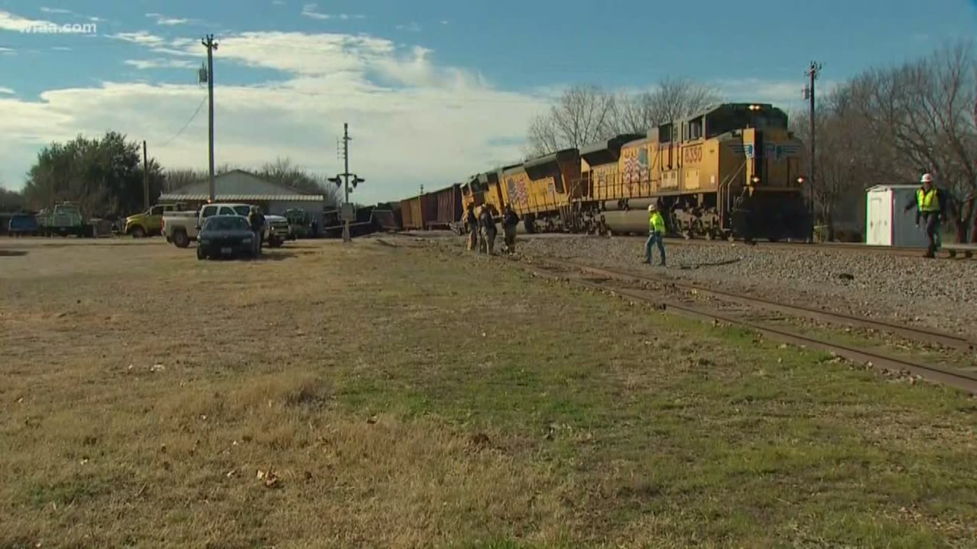 Freight train derails near house in Aubrey