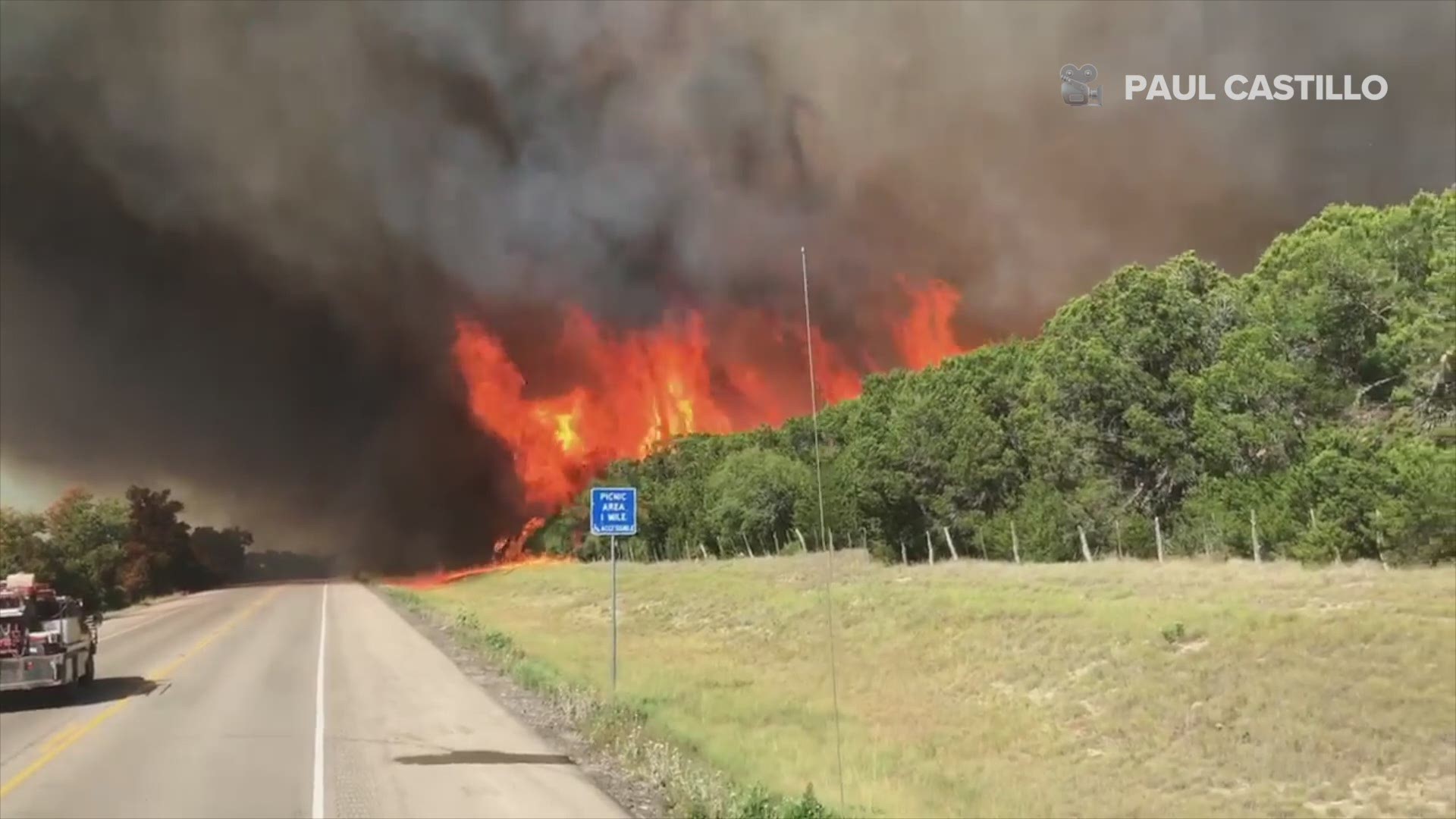 A wildfire burns trees and brush west of Palo Pinto. The fire since grew to more than 1,500 acres. Video: Paul Castillo