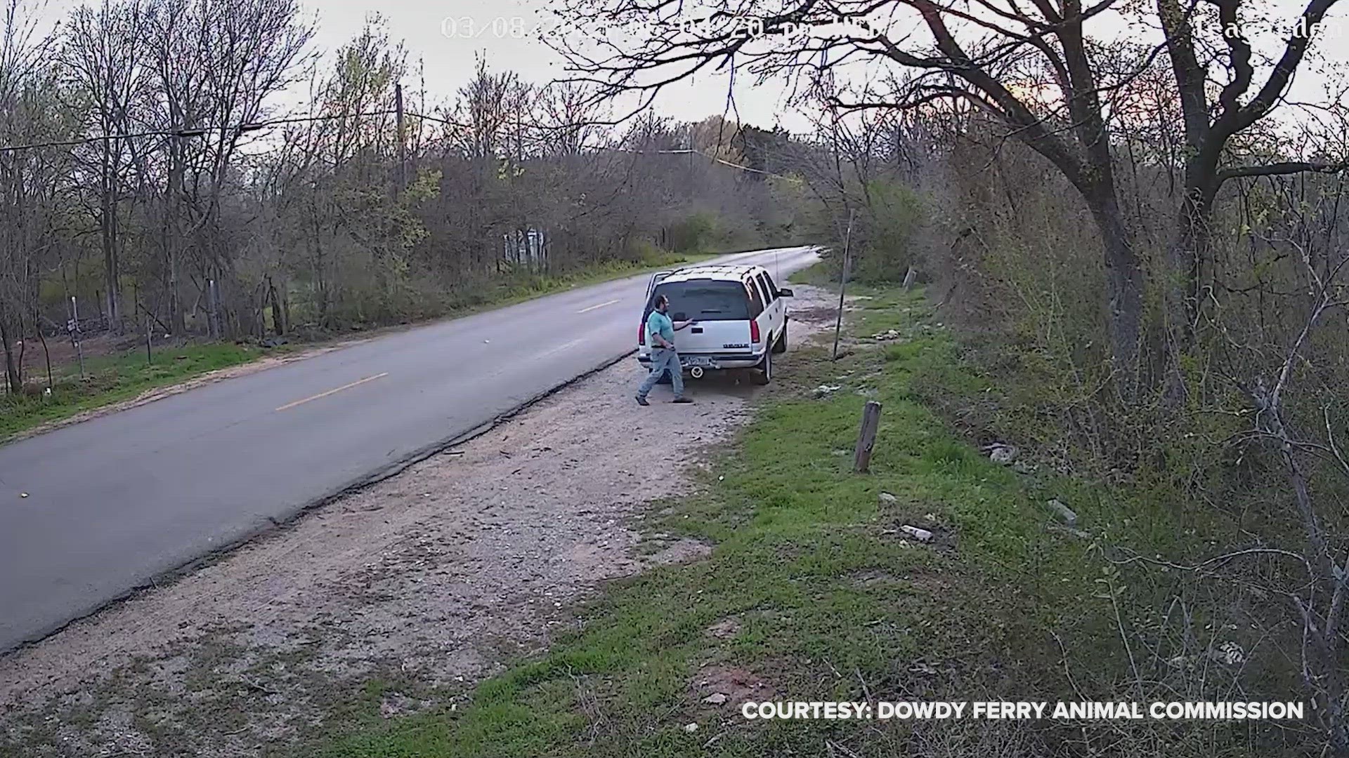 A man in a white Chevy SUV is caught on camera leaving a dog on the side of the road near Dowdy Ferry and Teagarden Road in Dallas.