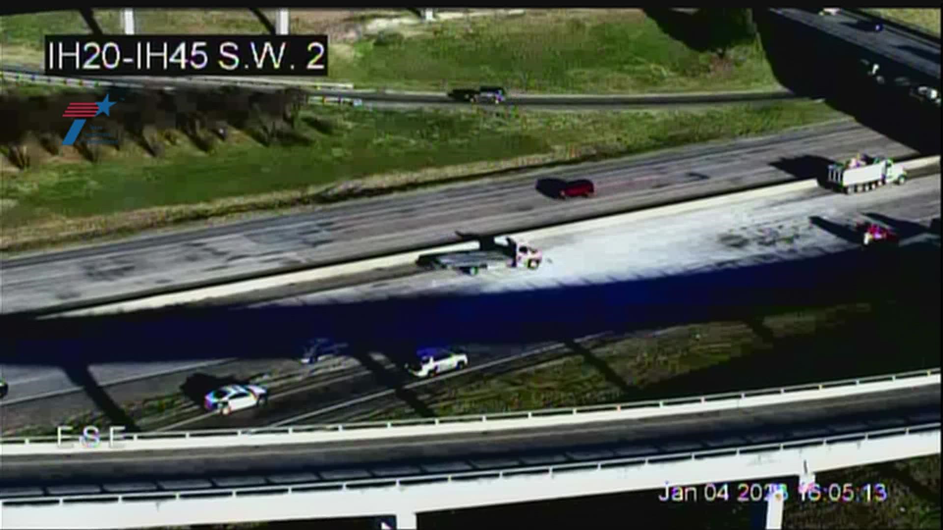 Aerial images showed there is debris on the highway and a significant backup behind the crash.