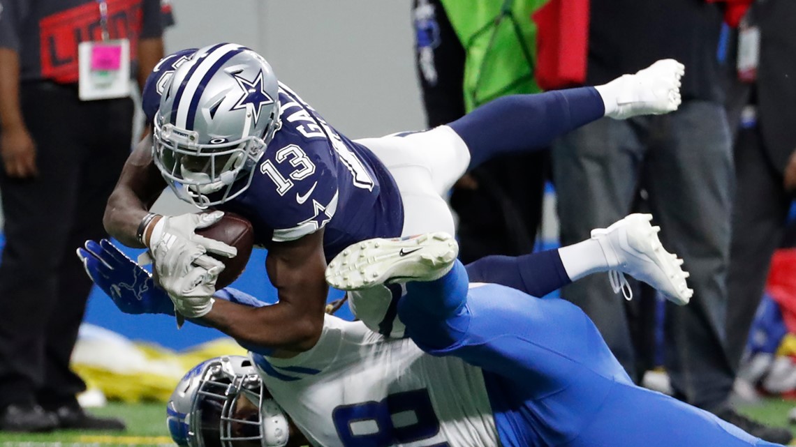 Cowboys get huge day from Prescott, beat Lions 35-27