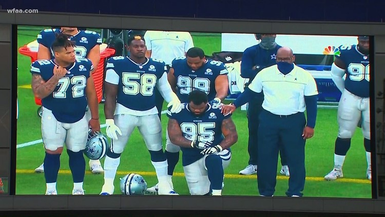 Cowboys defensive lineman Dontari Poe kneels in protest of social injustice