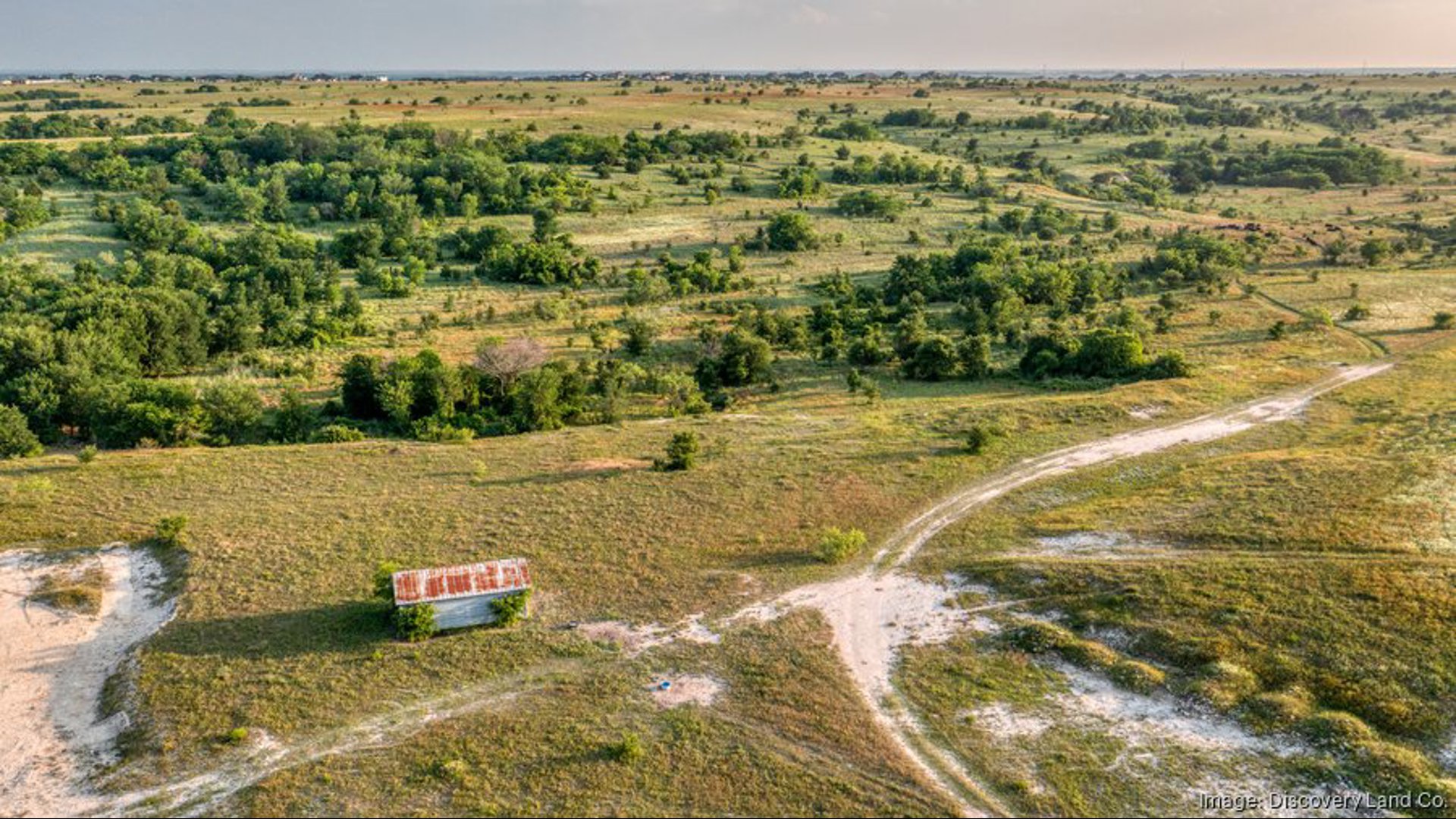 Discovery Land Co. plans a 1,100-acre gated community in Fort Worth featuring three golf courses by Tom Fazio.