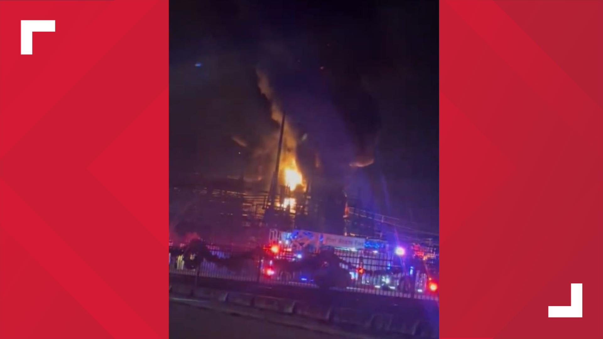 Oncor said the fire has caused power outages for some customers in the area.