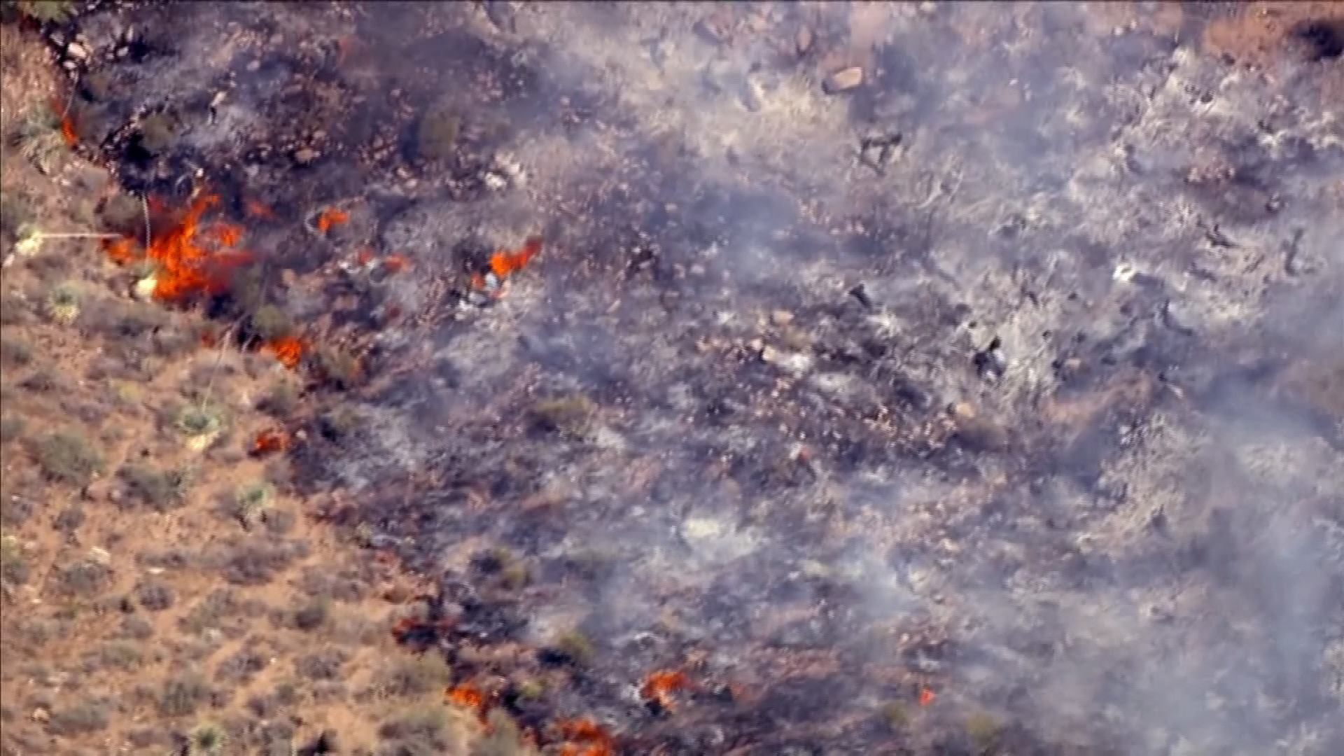 A large brush fire burning northeast of Fountain Hills in the East Valley has led to road closures and evacuation preparations for some area residents.