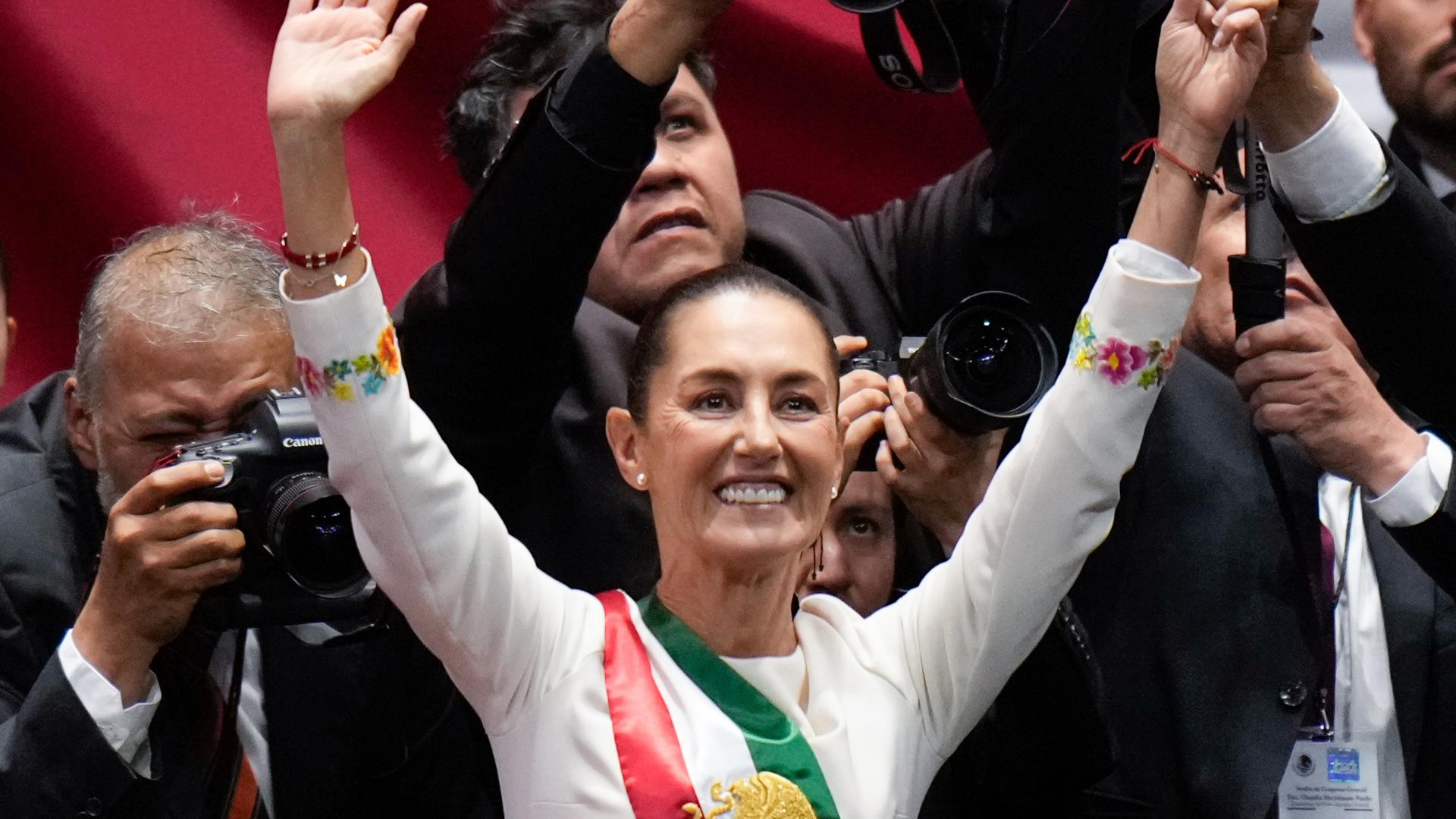 Claudia Sheinbaum was sworn in Tuesday as Mexico’s first female president, riding the enthusiasm over her predecessor’s social programs.