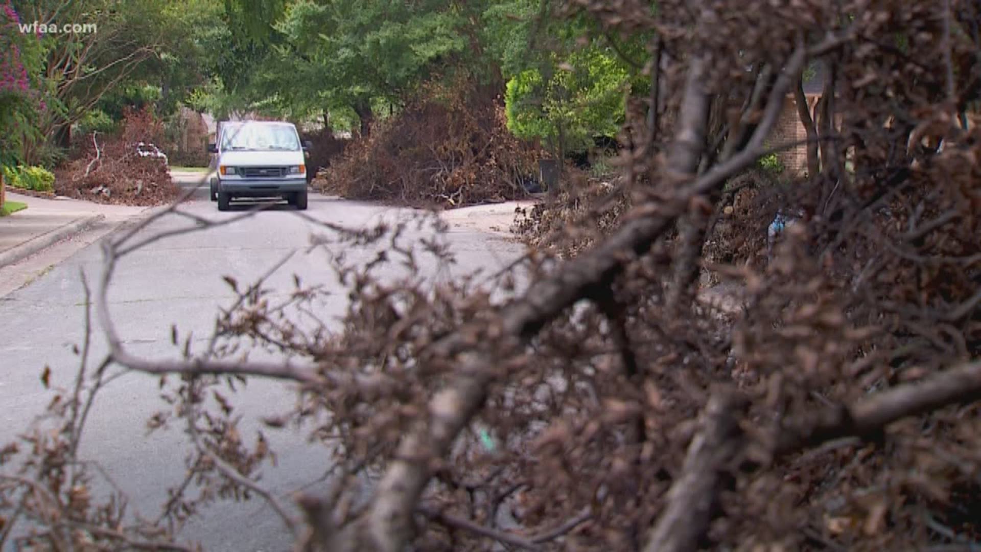 It’s been nearly one month since a devastating storm hit Dallas County and crews are still struggling to keep up with the mountains of debris.