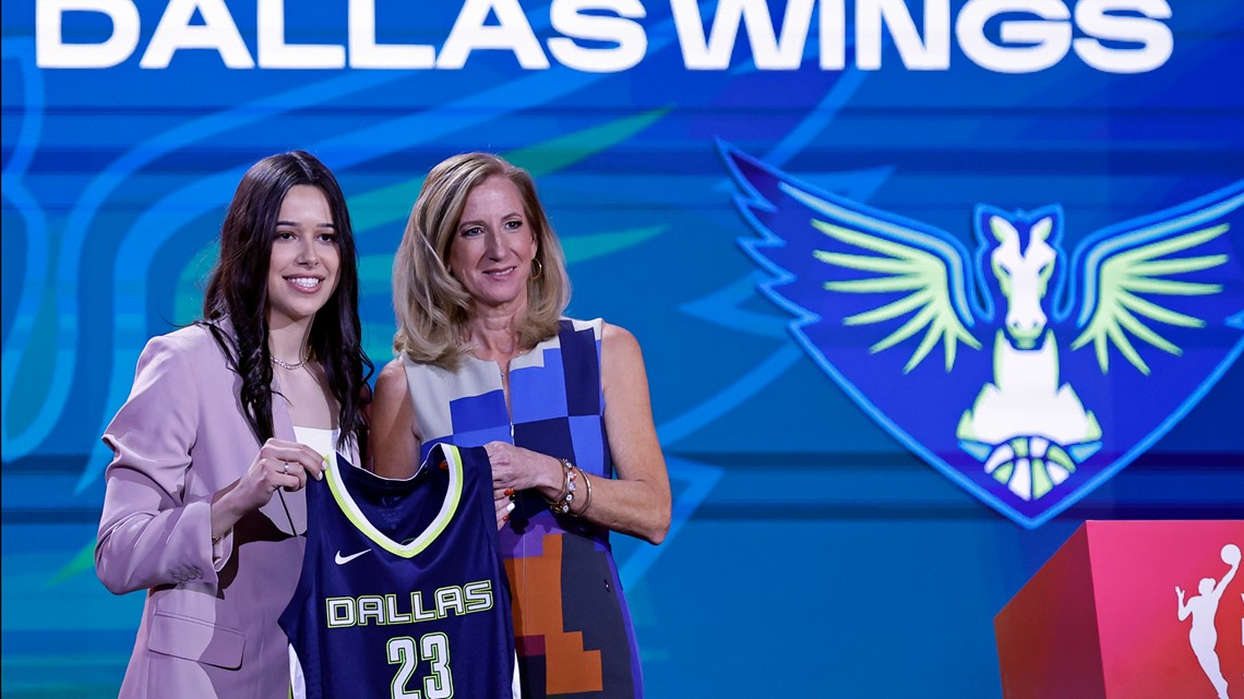 Maddy Siegrist of the Dallas Wings arrives to the arena before the