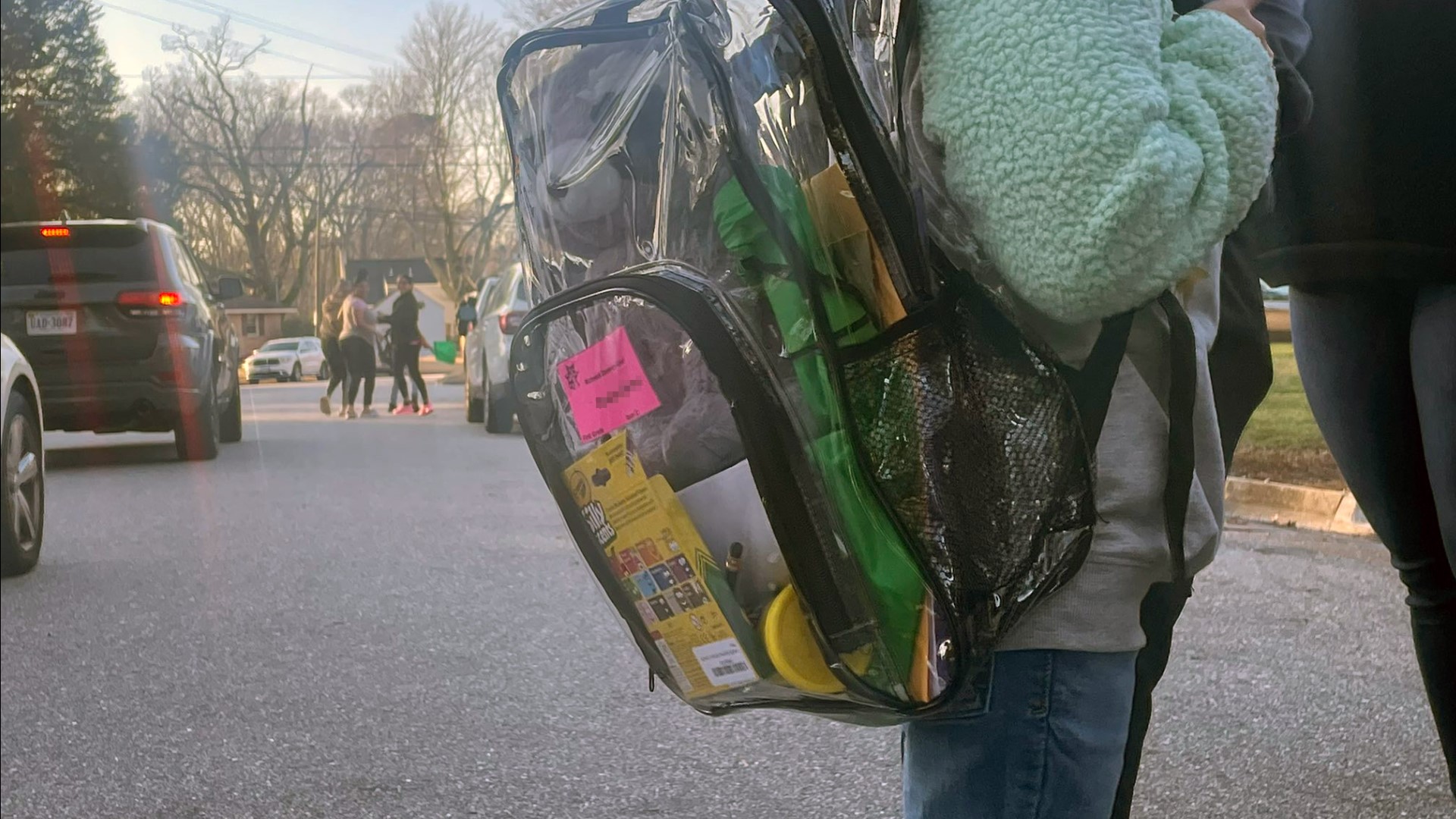 The district will offer free clear backpacks for students who request one. Officials cited safety measures as the reason for the new policy.